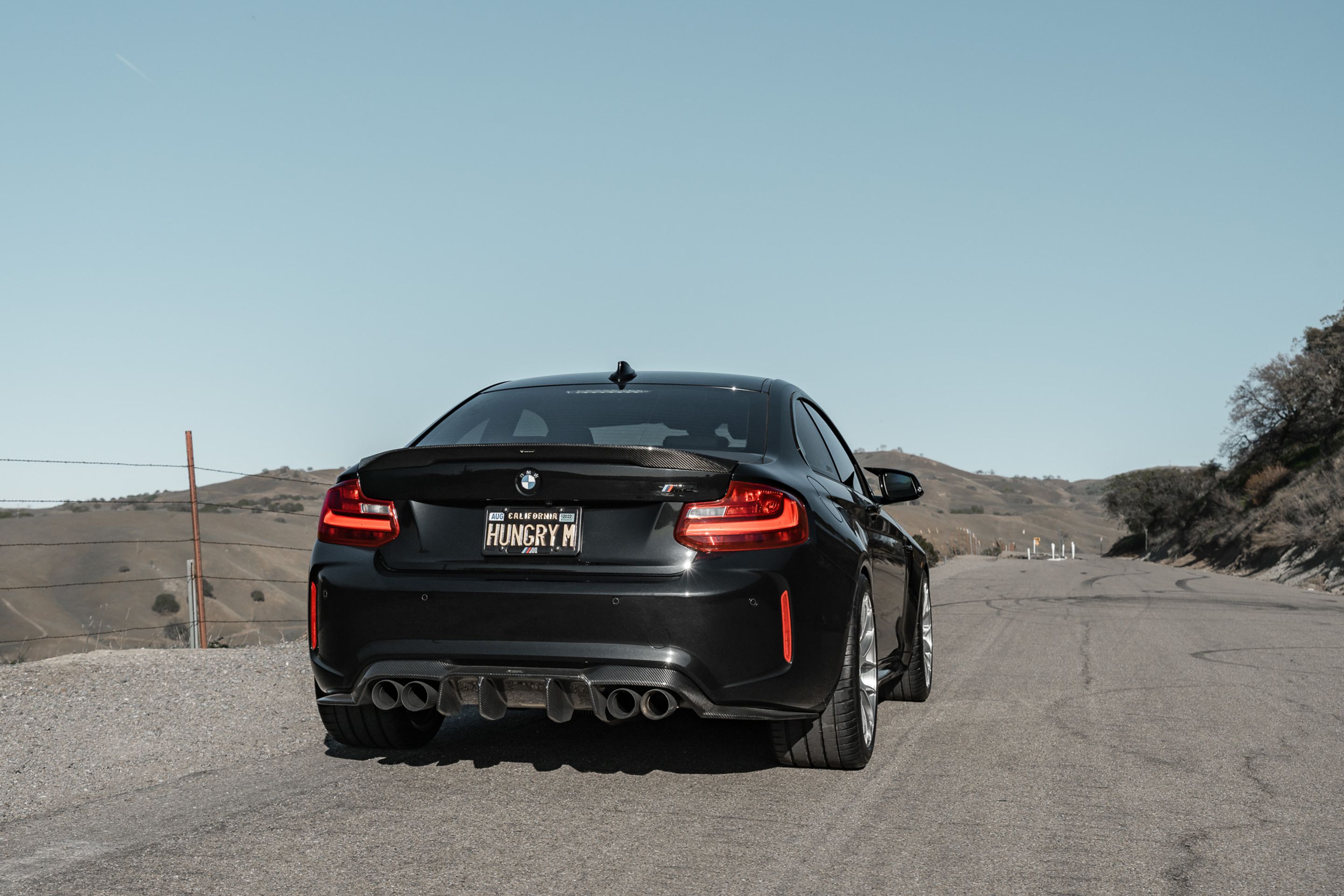 Black BMW F87 M2 with 19" EC-7RS Apex wheels in Brushed Clear
