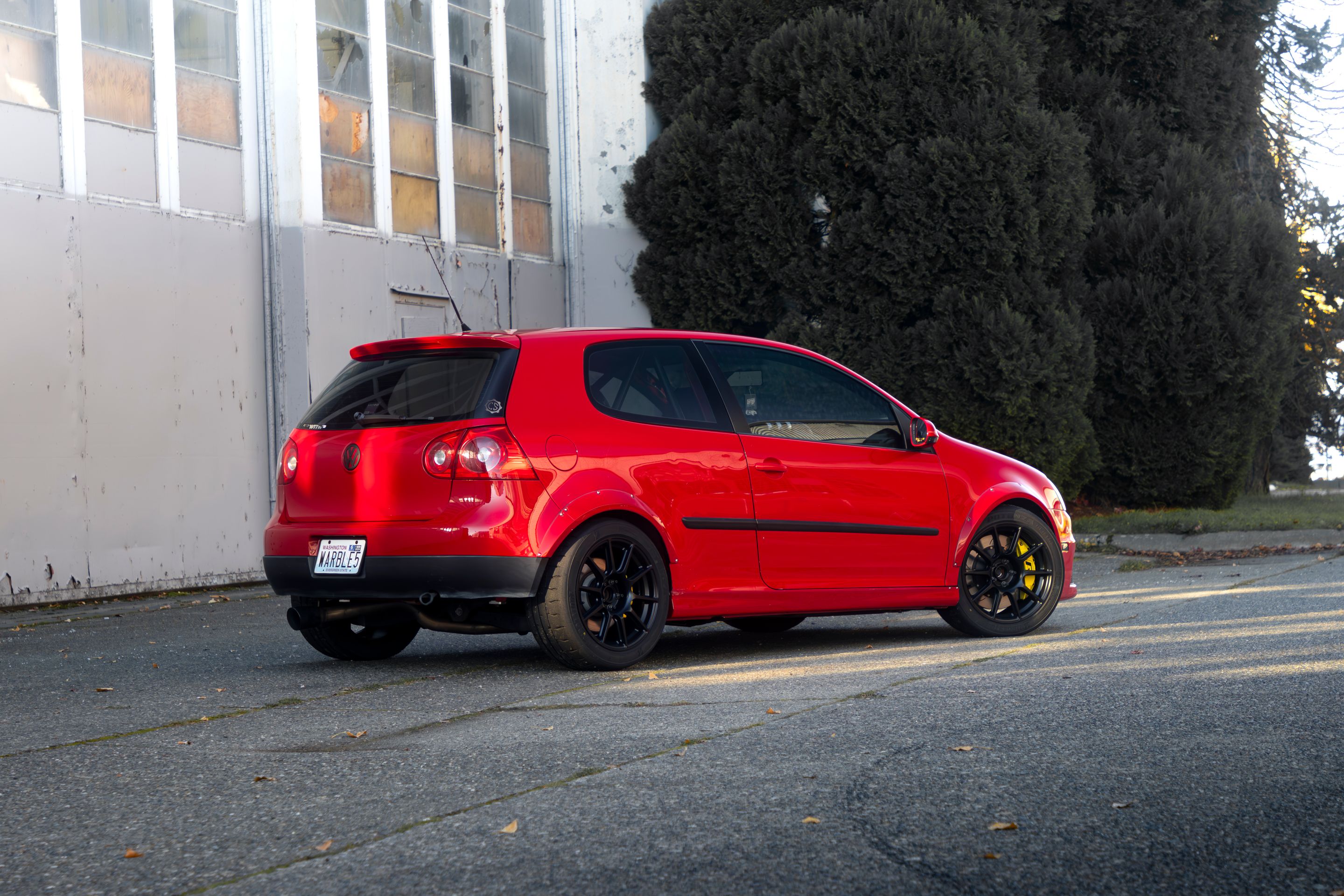 Red VW MK5 Golf with 17" SM-10 Apex wheels in Satin Black