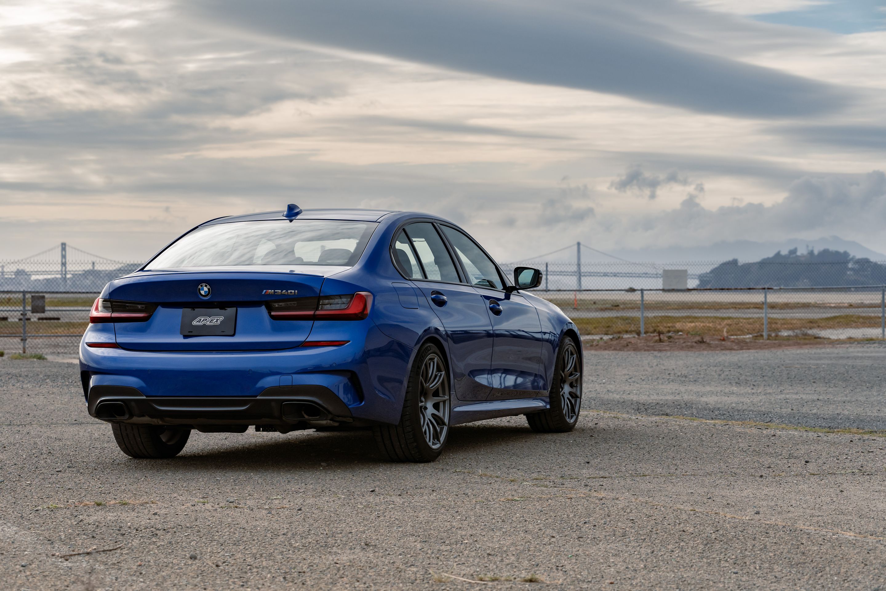 Blue BMW G20 Sedan 3 Series with 19" SM-10 Apex wheels in Anthracite