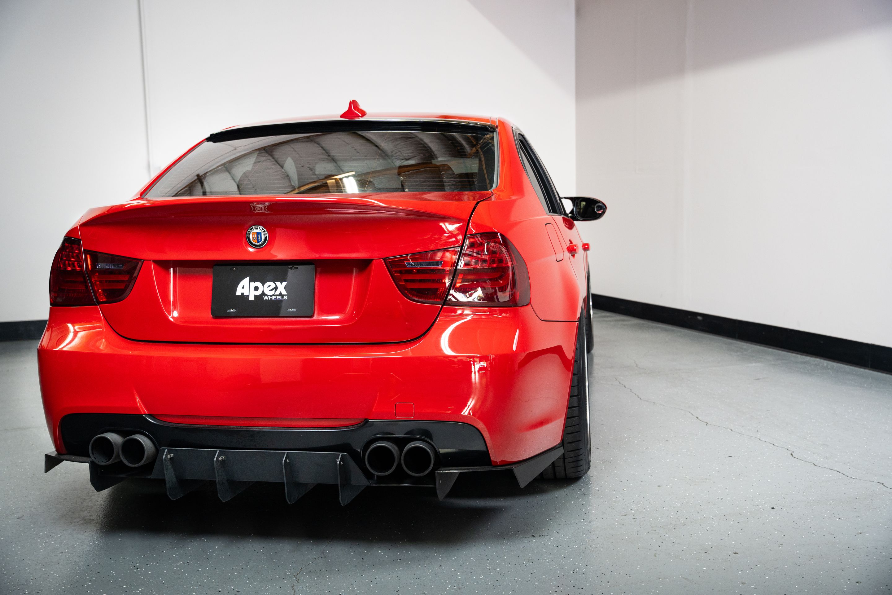 Red BMW E90 Sedan 3 Series with 18" ML-10RT Apex wheels in Machined Lip Gloss Motorsport Gold