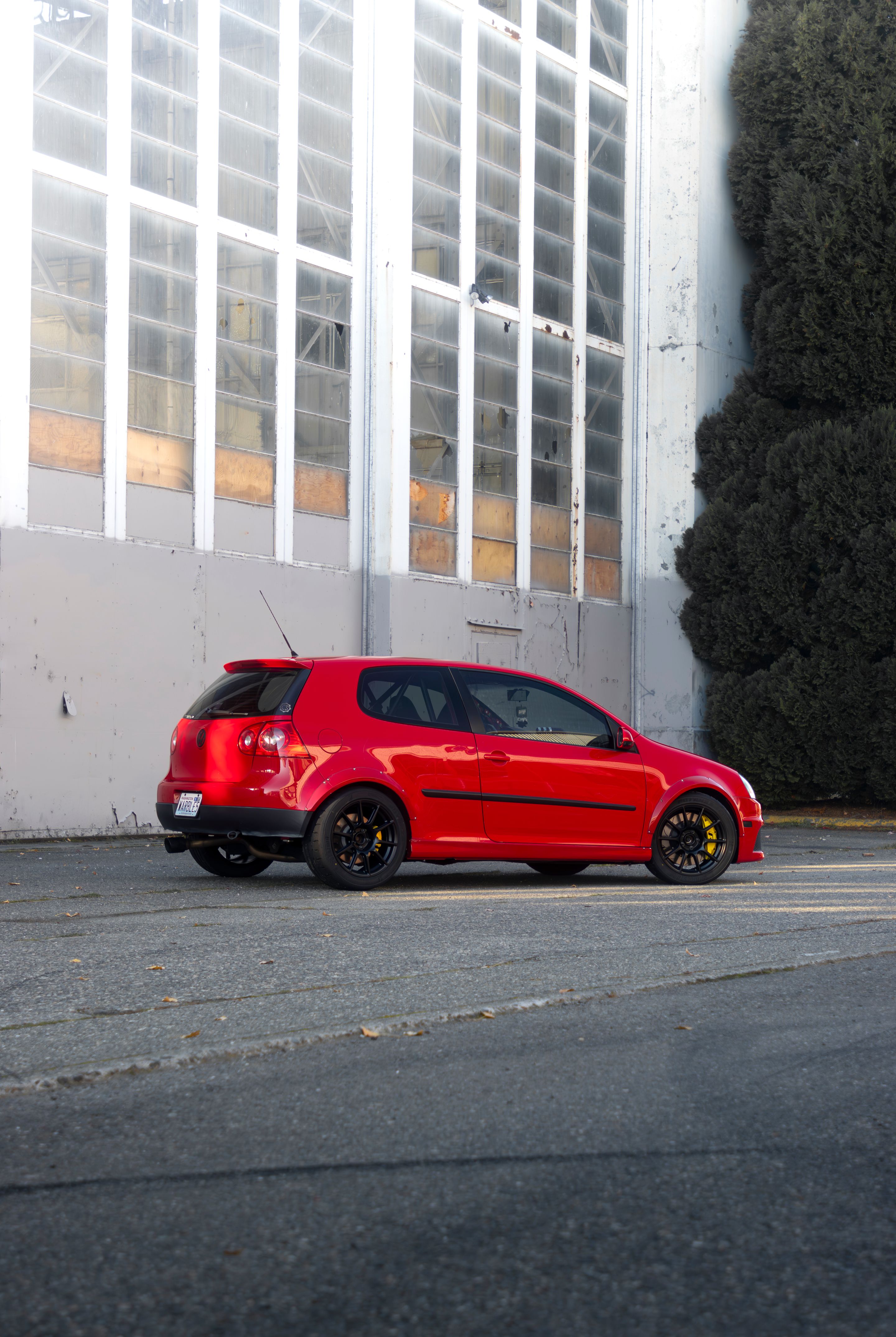Red VW MK5 Golf with 17" SM-10 Apex wheels in Satin Black