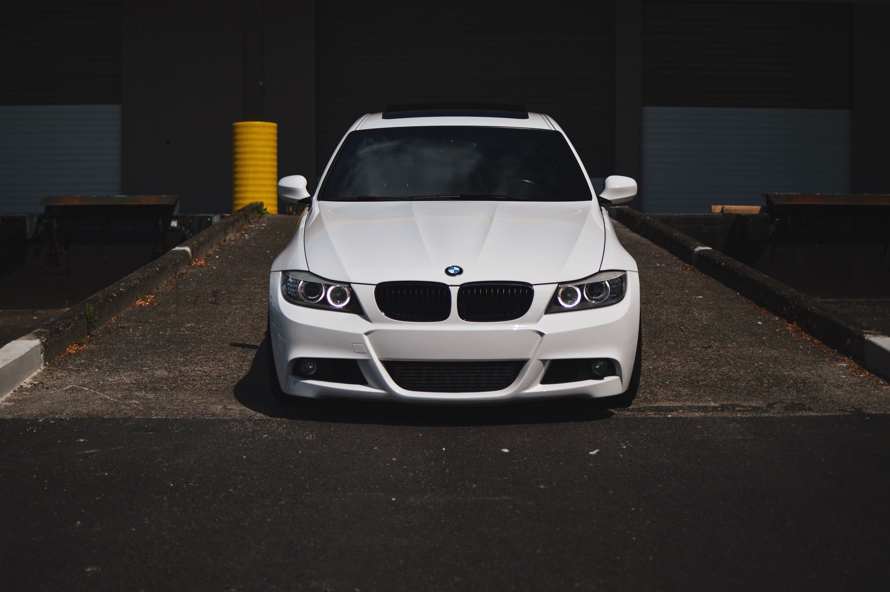 White BMW E90 LCI Sedan 3 Series with 18" ARC-8 Apex wheels in Hyper Black