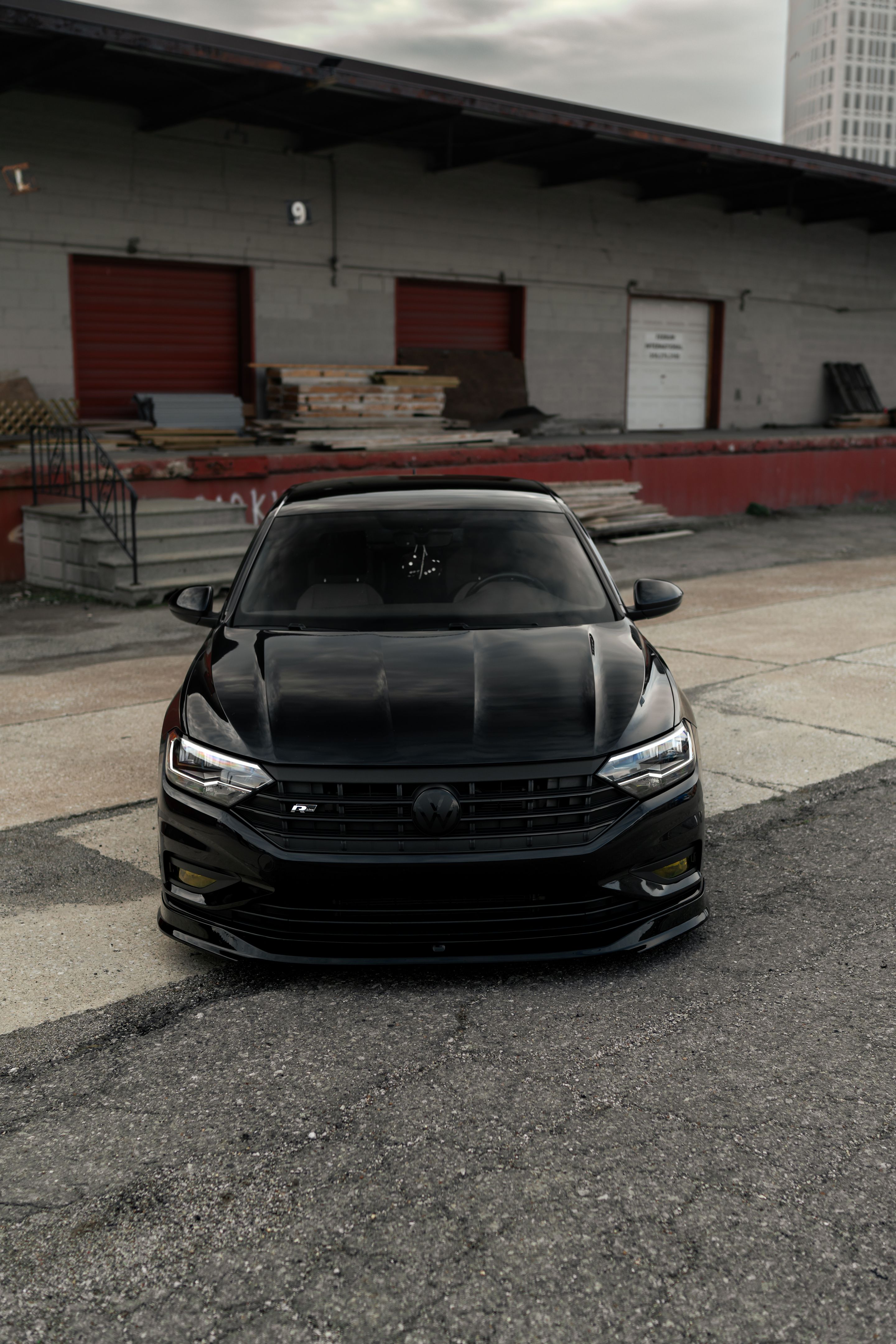 Black VW MK7 Jetta with 19" ML-10RT Apex wheels in Machined Lip Race Silver