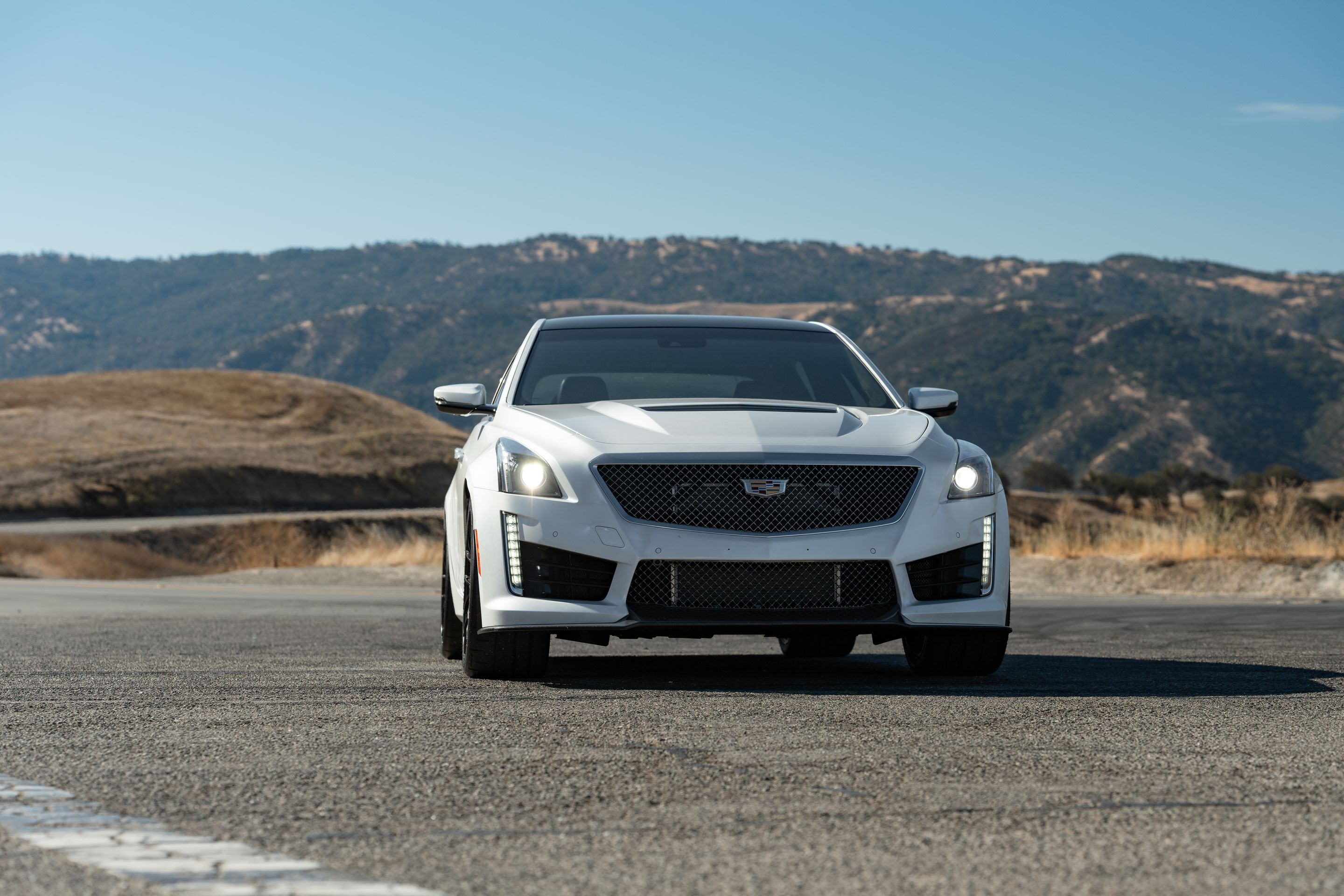 White Cadillac Gen 3 CTS-V with 19" EC-7RS Apex wheels in Satin Black