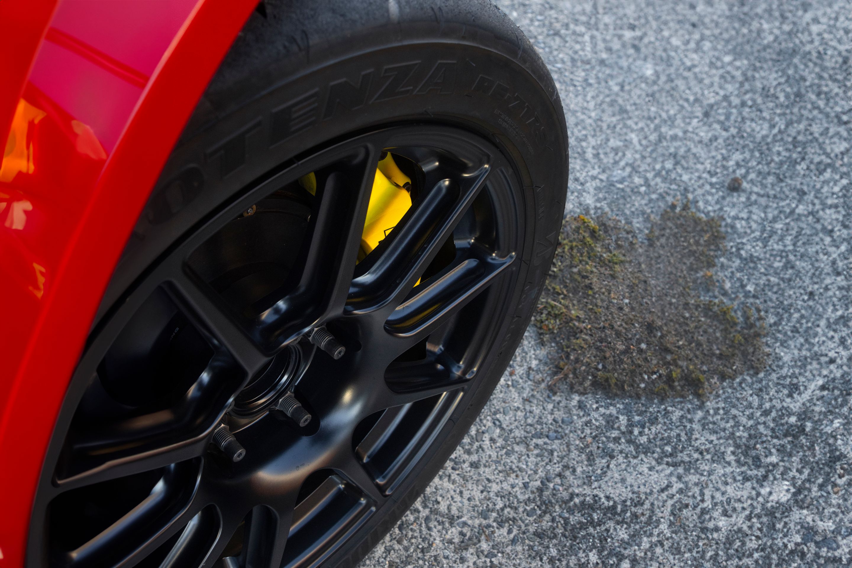 Red VW MK5 Golf with 17" SM-10 Apex wheels in Satin Black