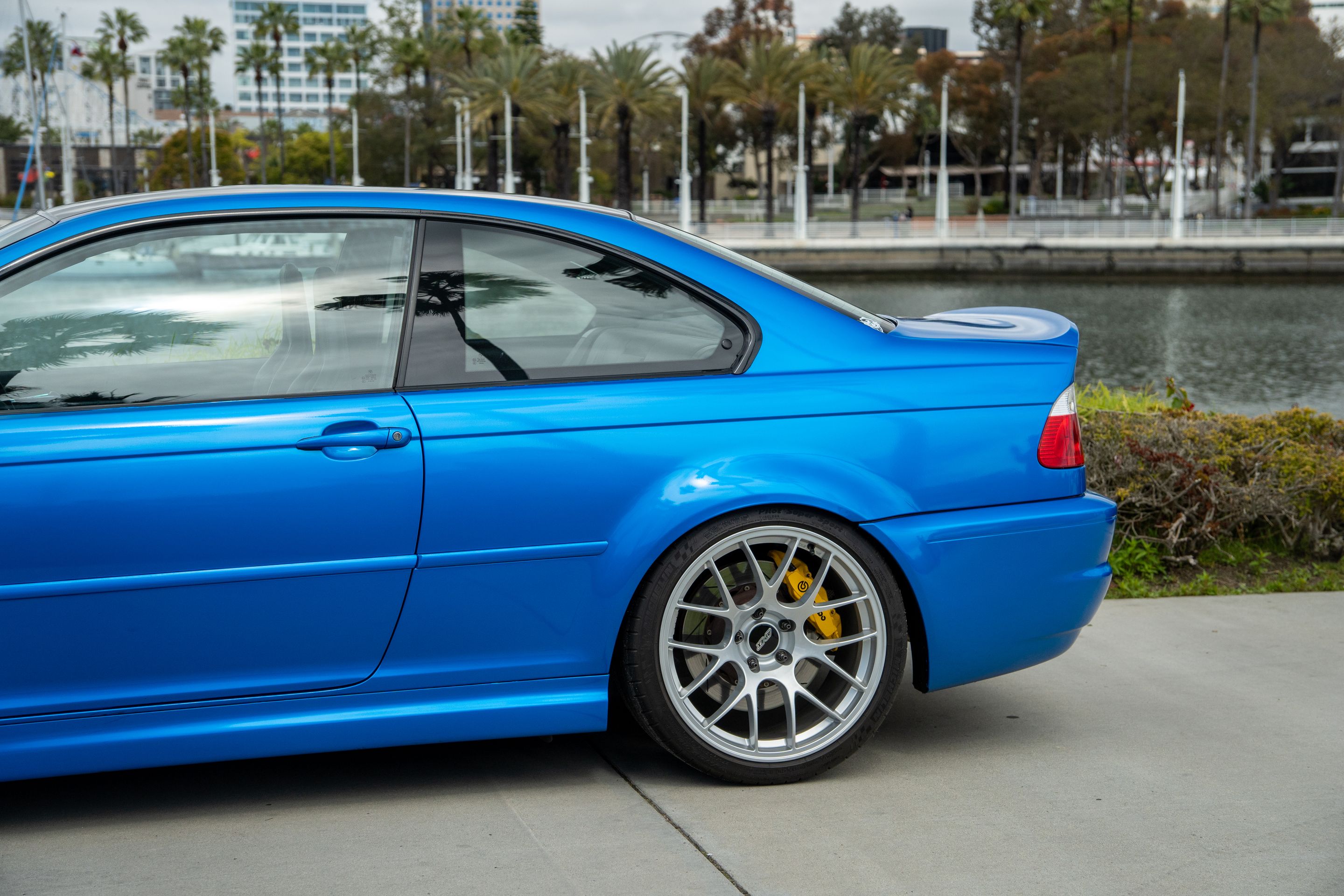 Blue BMW E46 M3 with 19" EC-7 Apex wheels in Race Silver