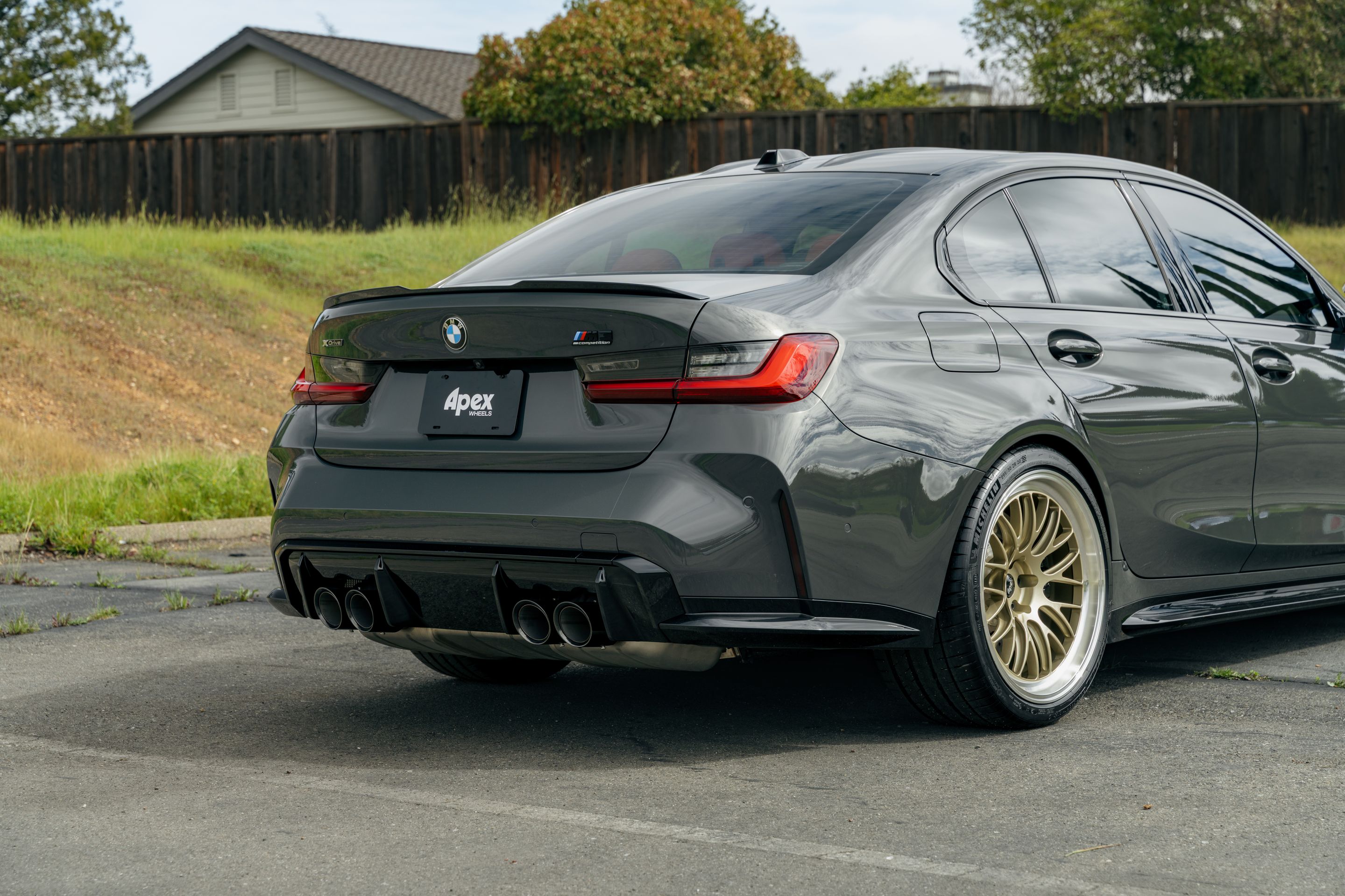 Grey BMW G80 M3 with 19"/20" ML-10RT Apex wheels in Machined Lip Gloss Motorsport Gold