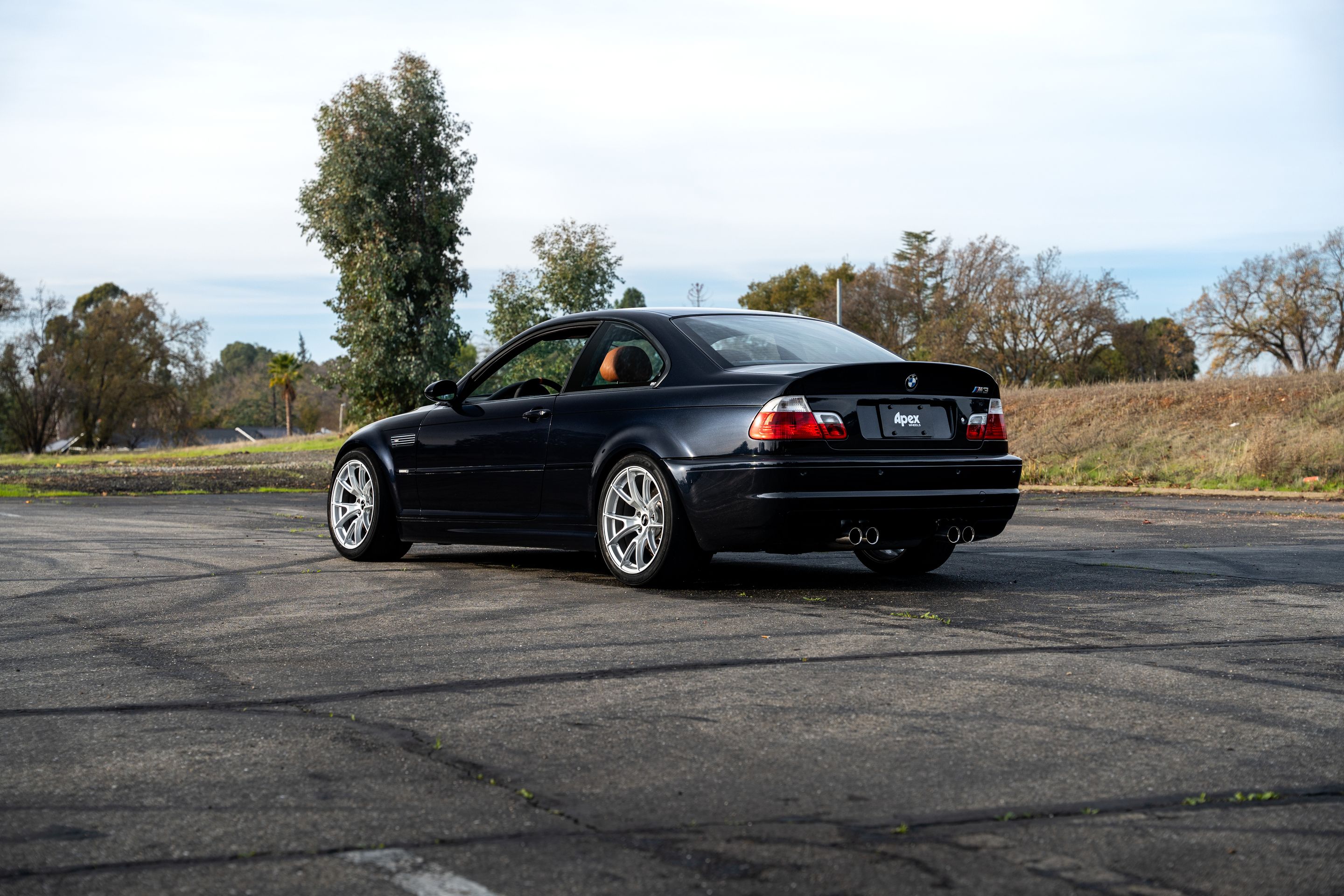 Black BMW E46 M3 with 18" VS-5 Apex wheels in Race Silver