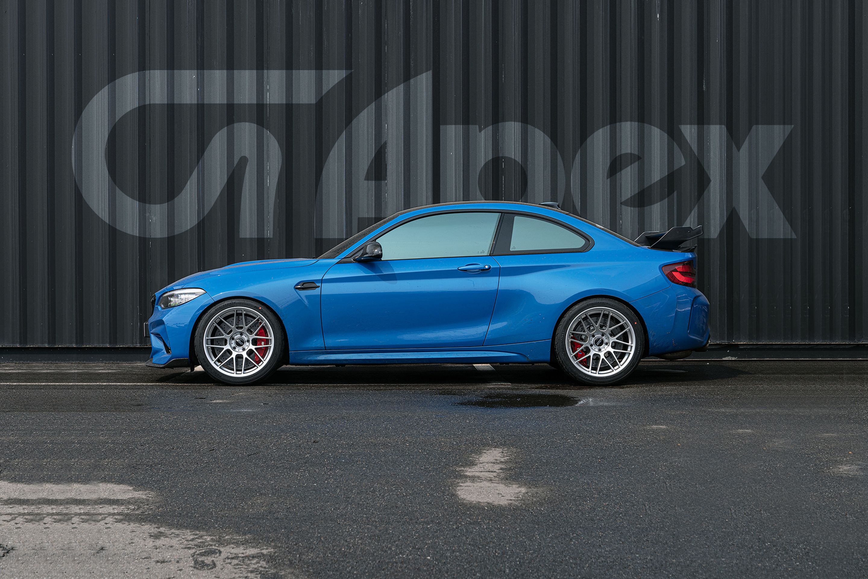 Blue BMW F87 M2 with 19" ARC-8 Apex wheels in Hyper Silver
