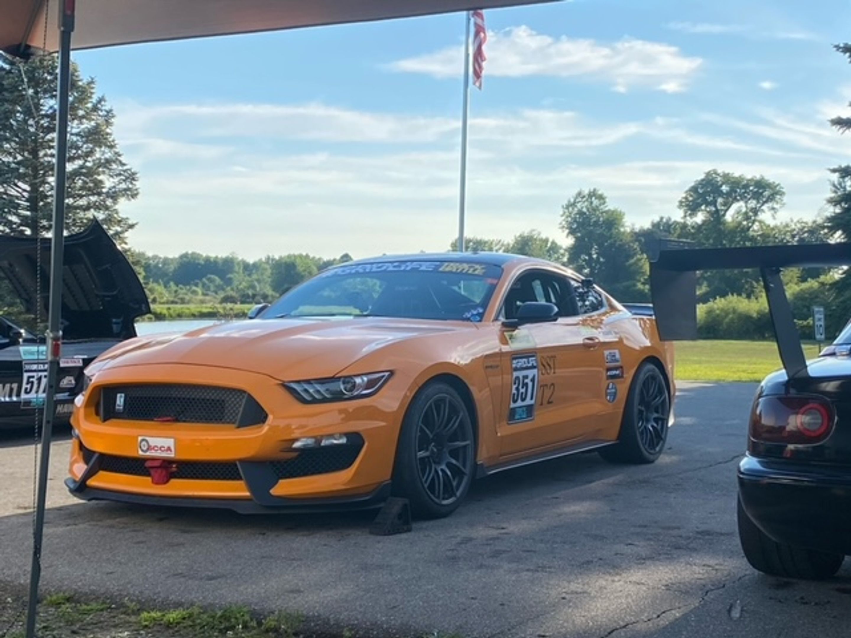 Orange Ford S550 Mustang GT350 with 19" SM-10 Apex wheels in Anthracite