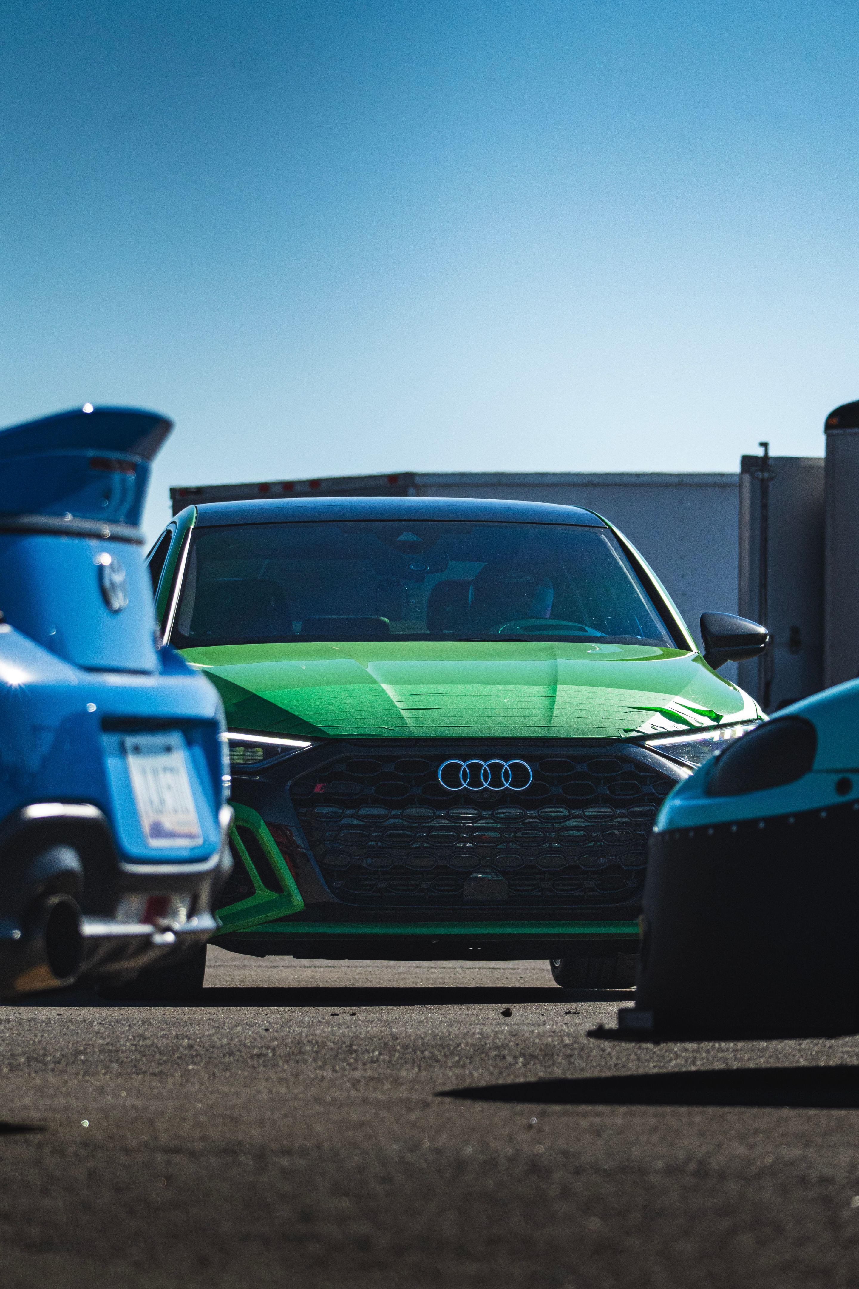 Green Audi 8Y RS 3 with 18" VS-5RS Apex wheels in Brushed Clear