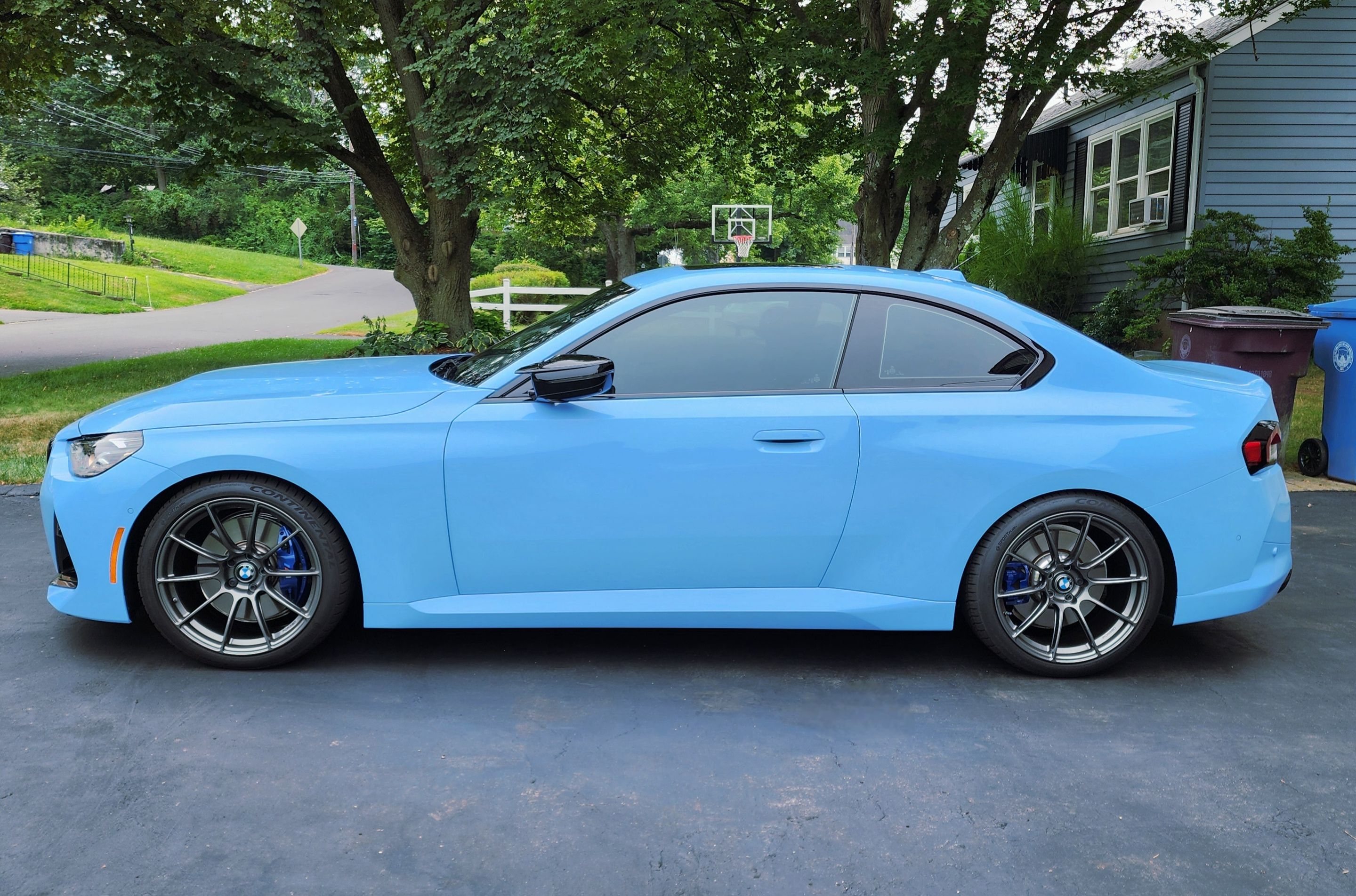 Blue BMW G42 2 Series with 19" SM-10RS Apex wheels in Anthracite