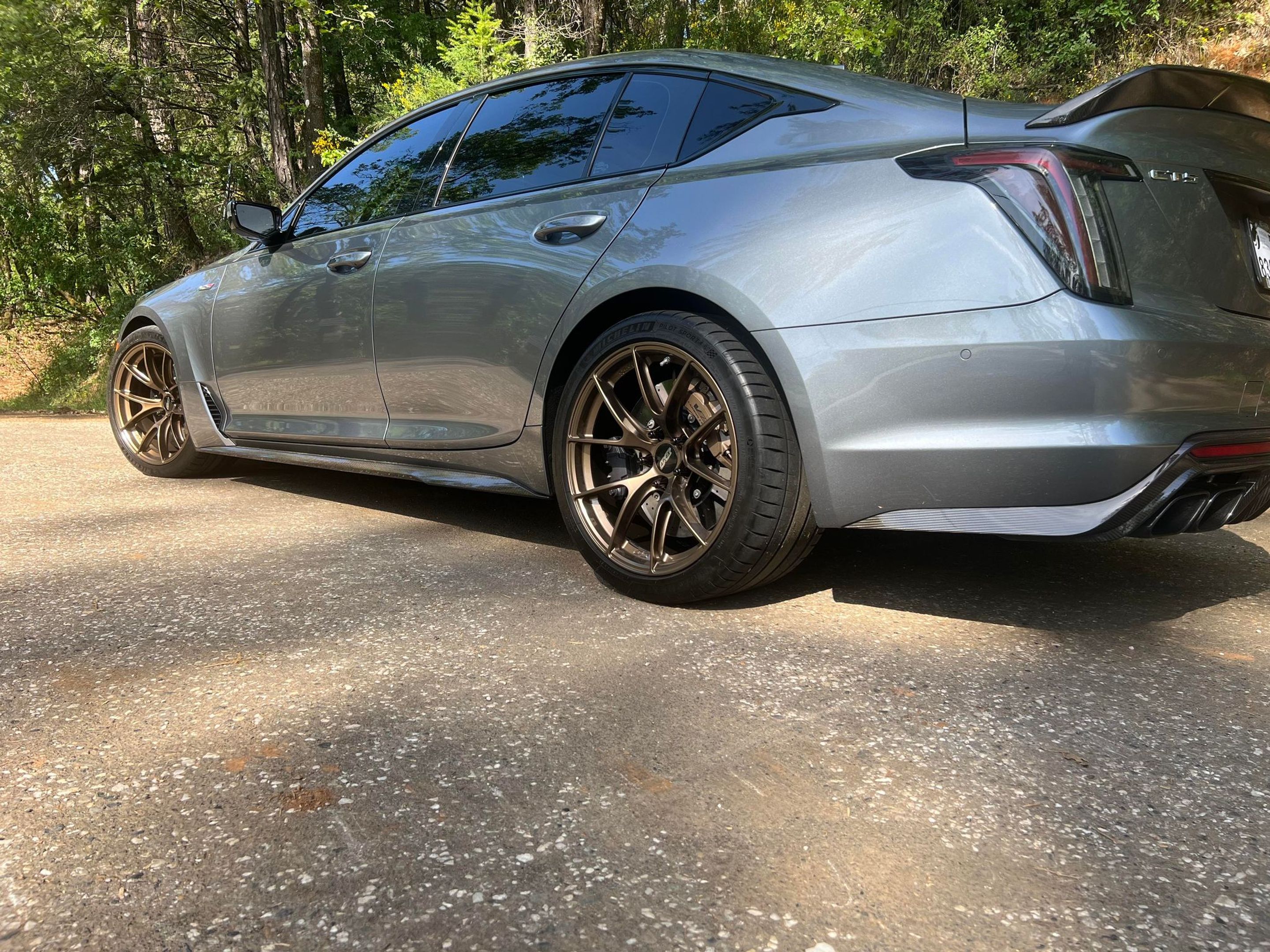 Grey Cadillac CT5-V Blackwing with 19" VS-5RS Apex wheels in Satin Bronze