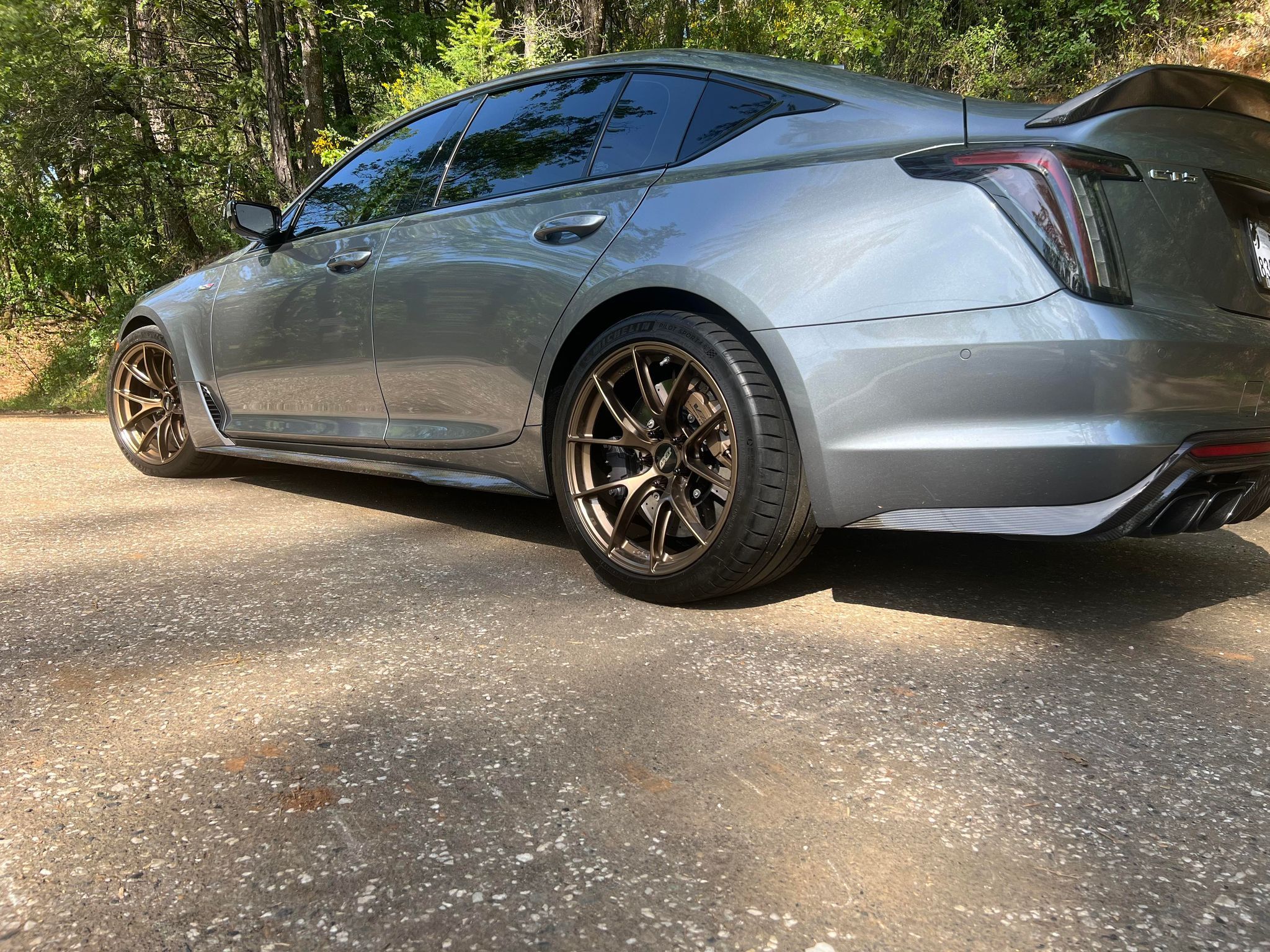 Grey Cadillac CT5-V Blackwing with 19" VS-5RS Apex wheels in Satin Bronze