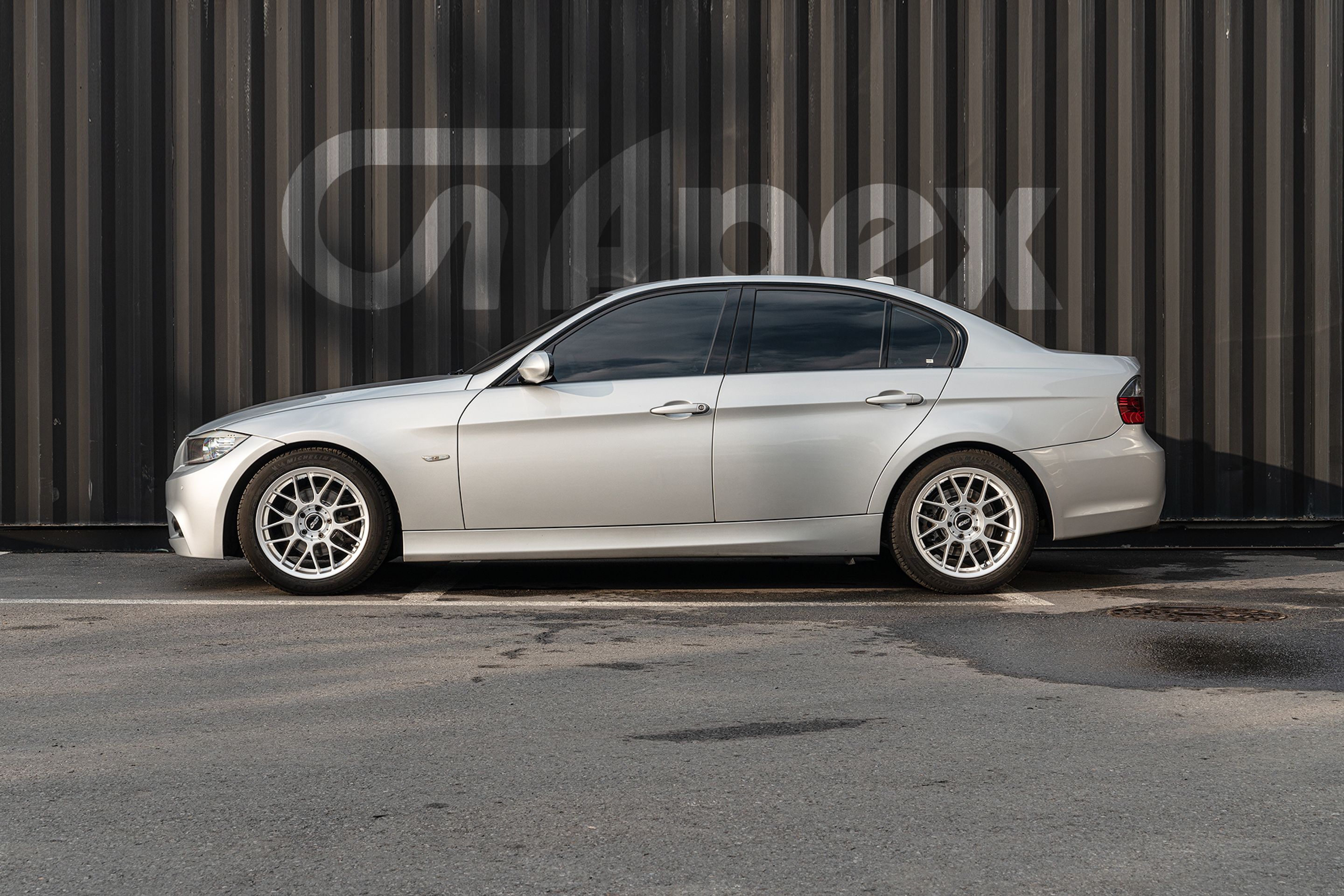 Silver BMW E90 Sedan 3 Series with 17" ARC-8 Apex wheels in Hyper Silver