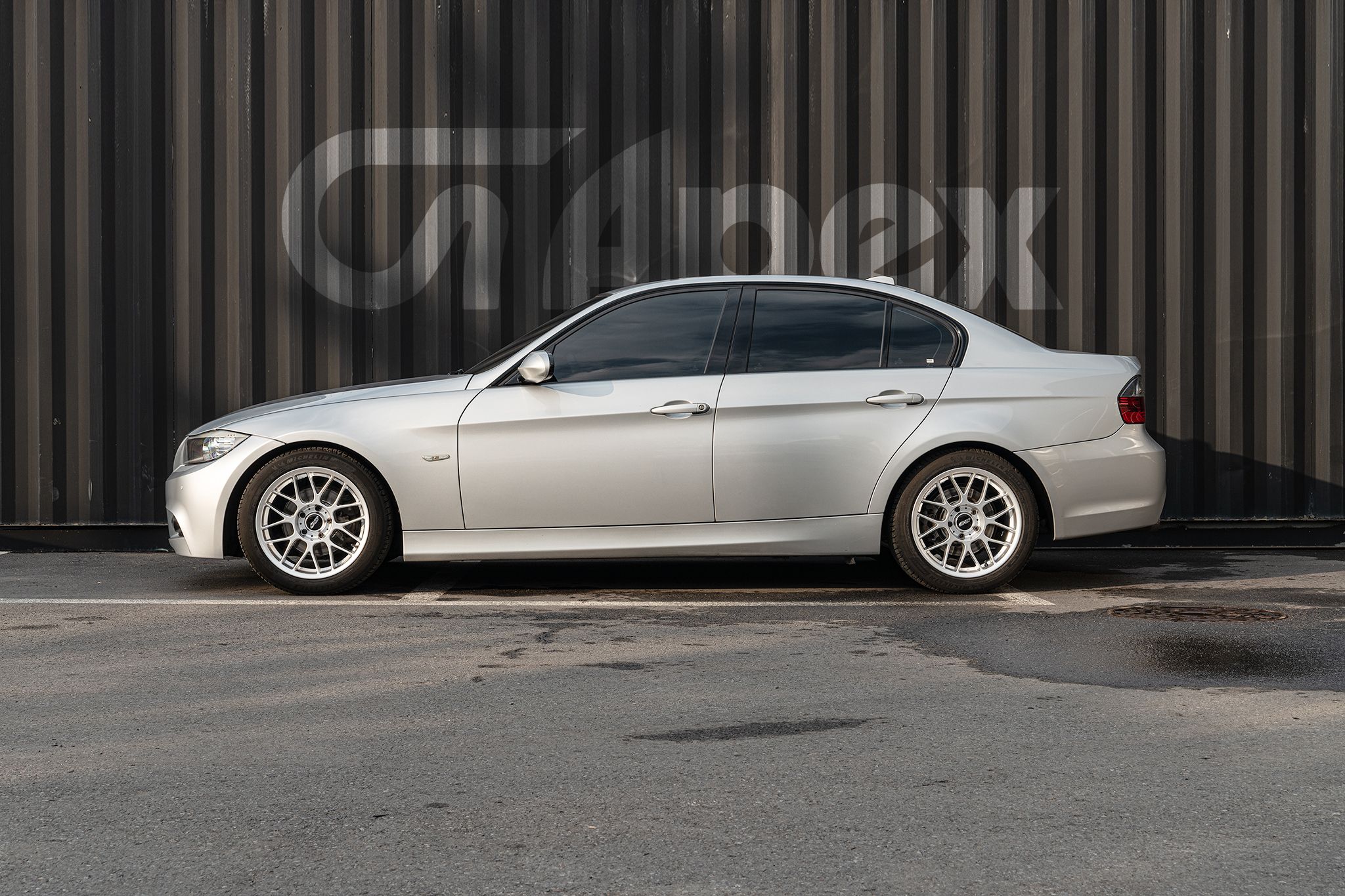Silver BMW E90 Sedan 3 Series with 17" ARC-8 Apex wheels in Hyper Silver