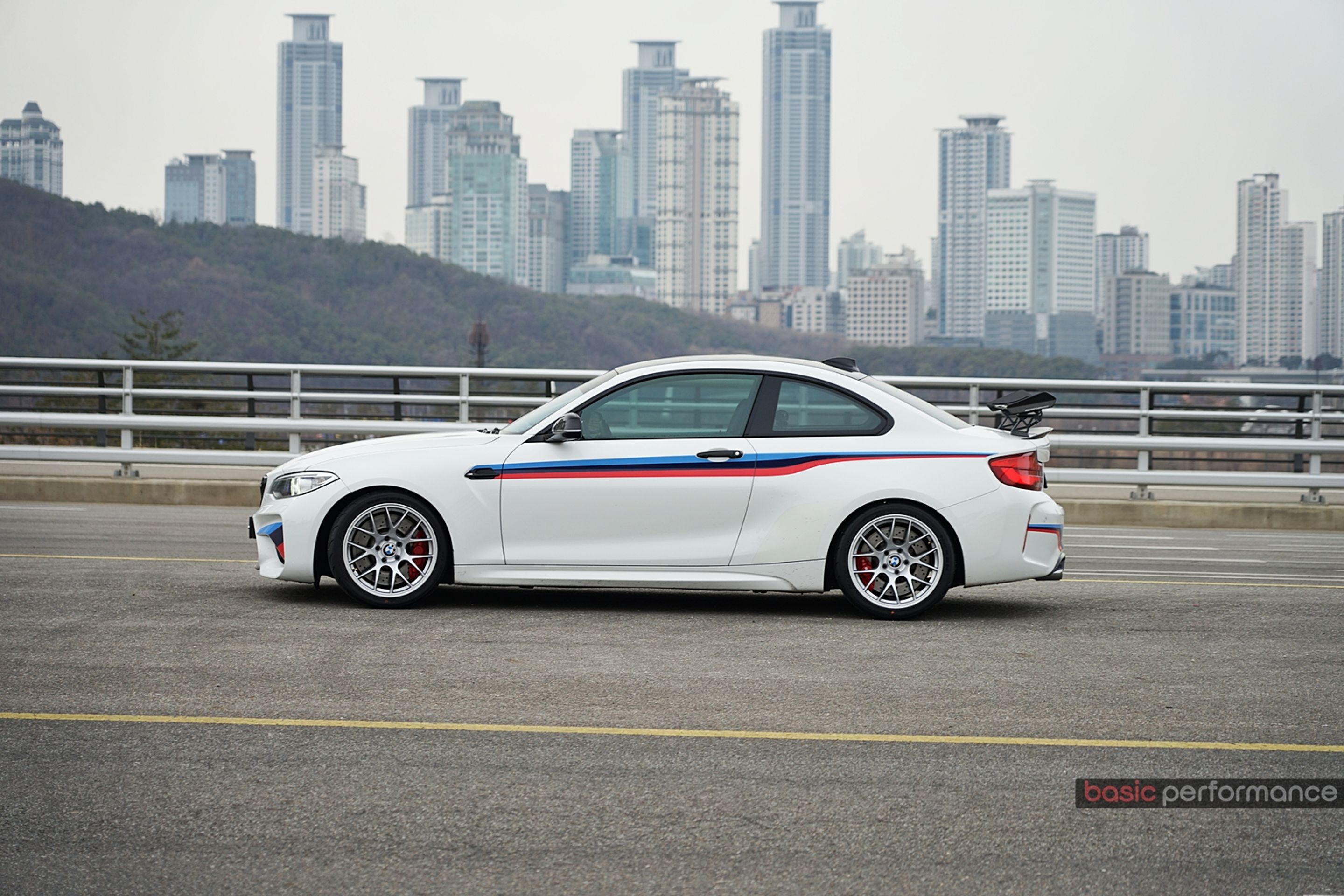 White BMW F87 M2 with 18" EC-7 Apex wheels in Race Silver