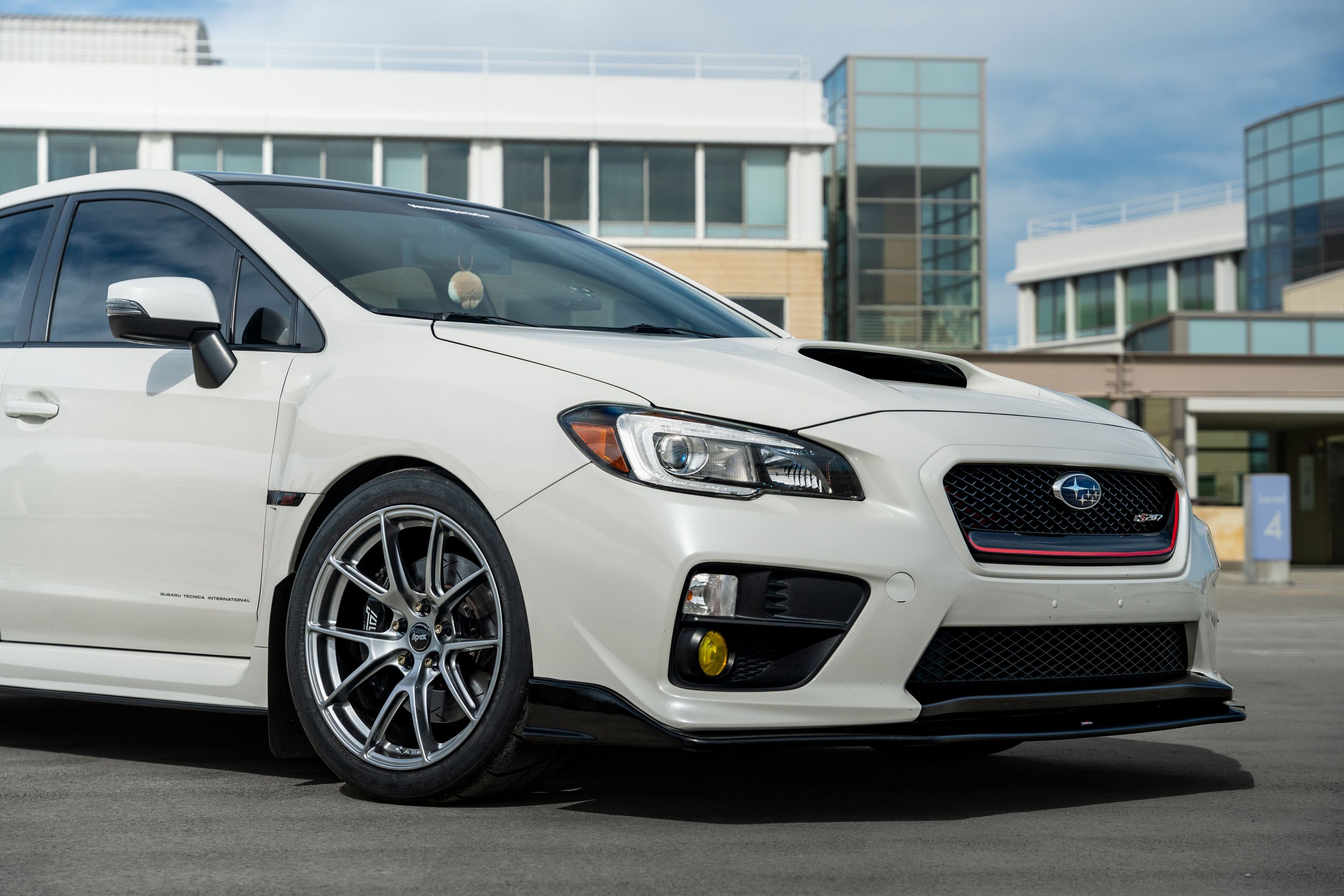 White Subaru VA WRX STI with 18" VS-5 Apex wheels in Hyper Black
