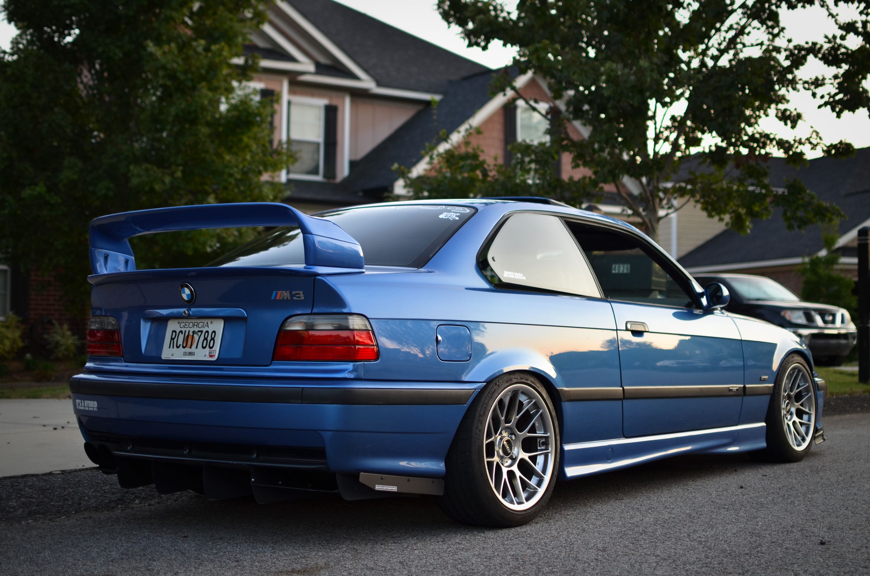 Blue BMW E36 M3 with 17" ARC-8 Apex wheels in Hyper Black