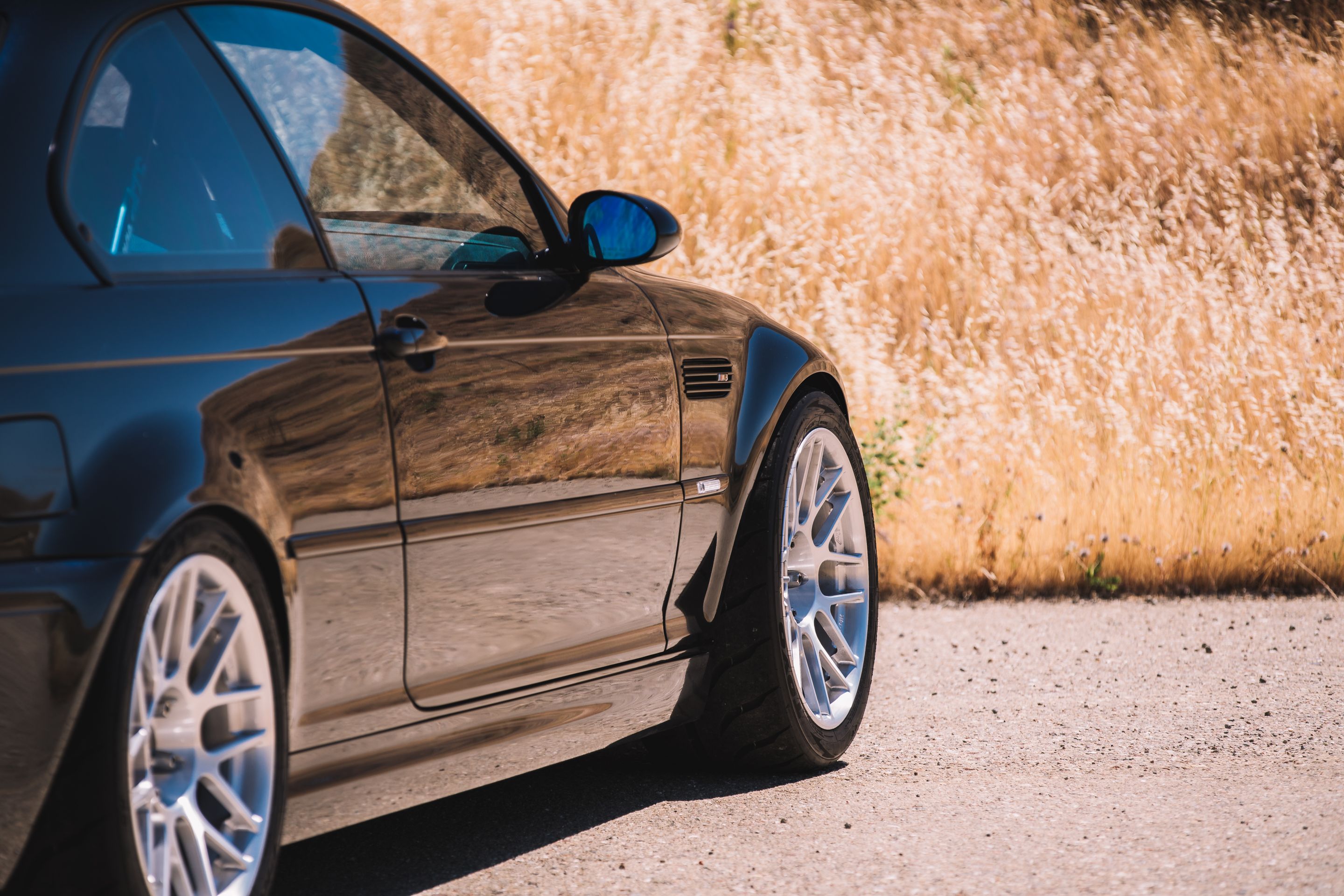 Black BMW E46 M3 with 18" ARC-8R Apex wheels in Brushed Clear