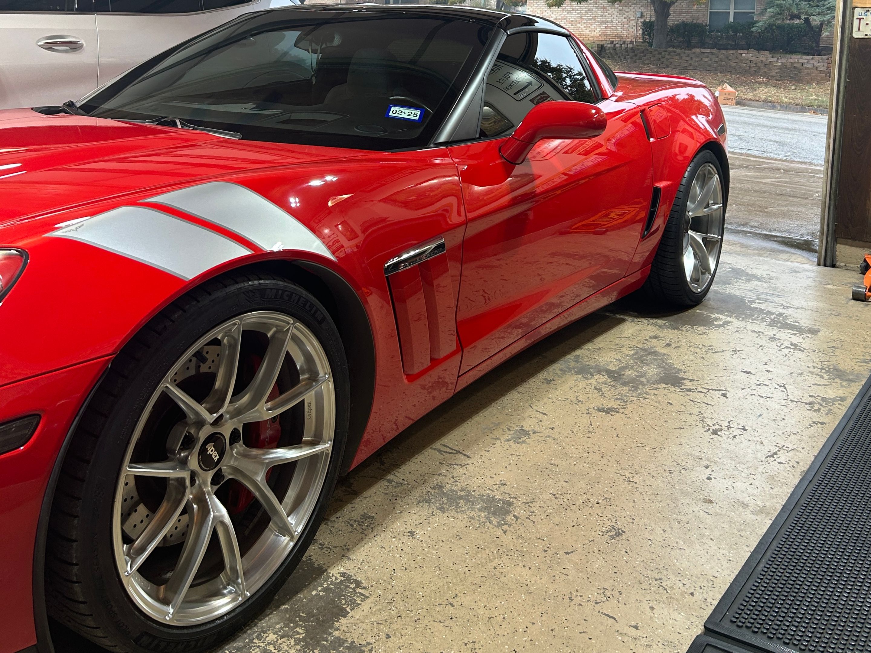 Red Chevrolet C6 Corvette Grand Sport with 19"/20" VS-5RS Apex wheels in Brushed Clear