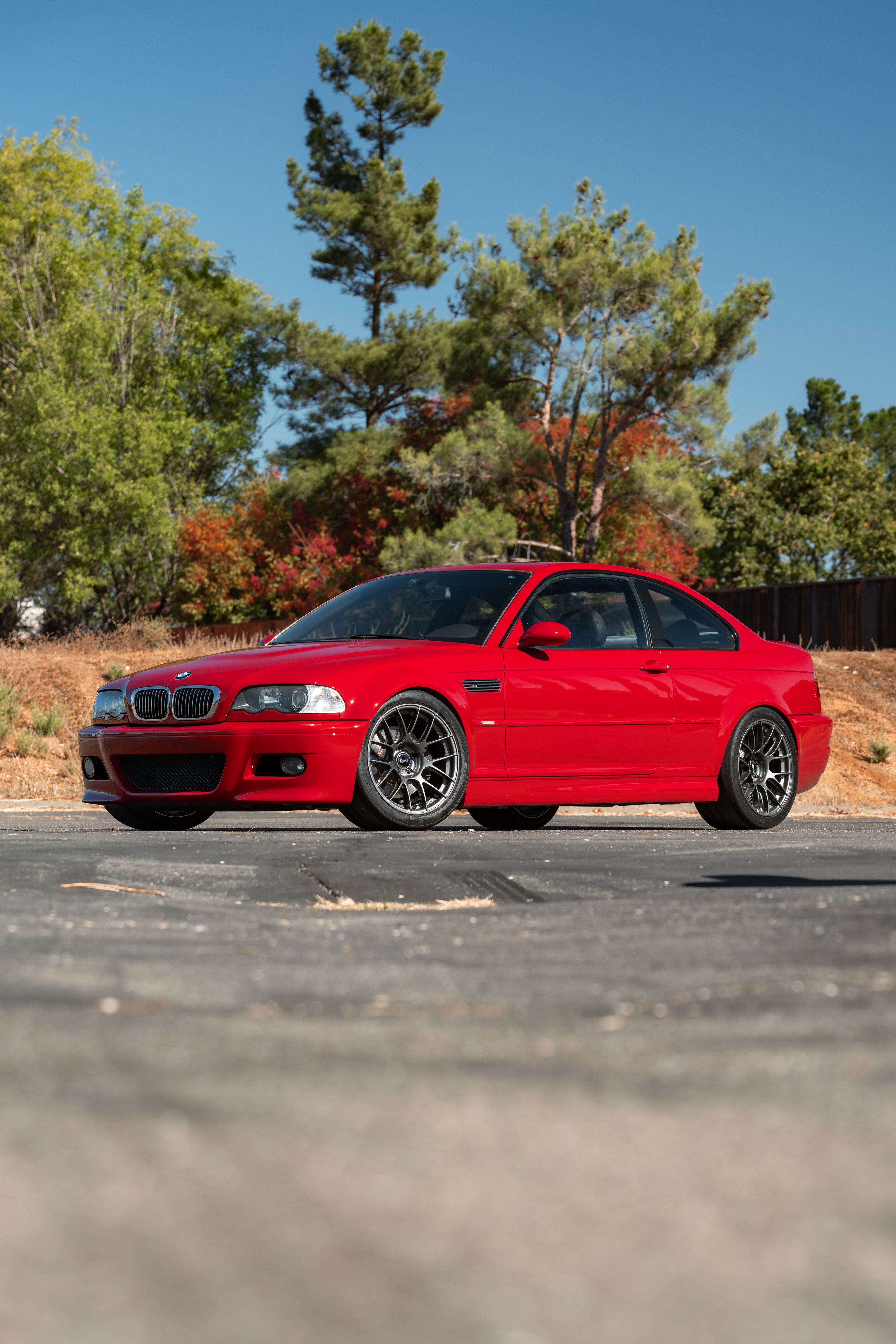 Red BMW E46 M3 with 18" EC-7RS Apex wheels in Anthracite