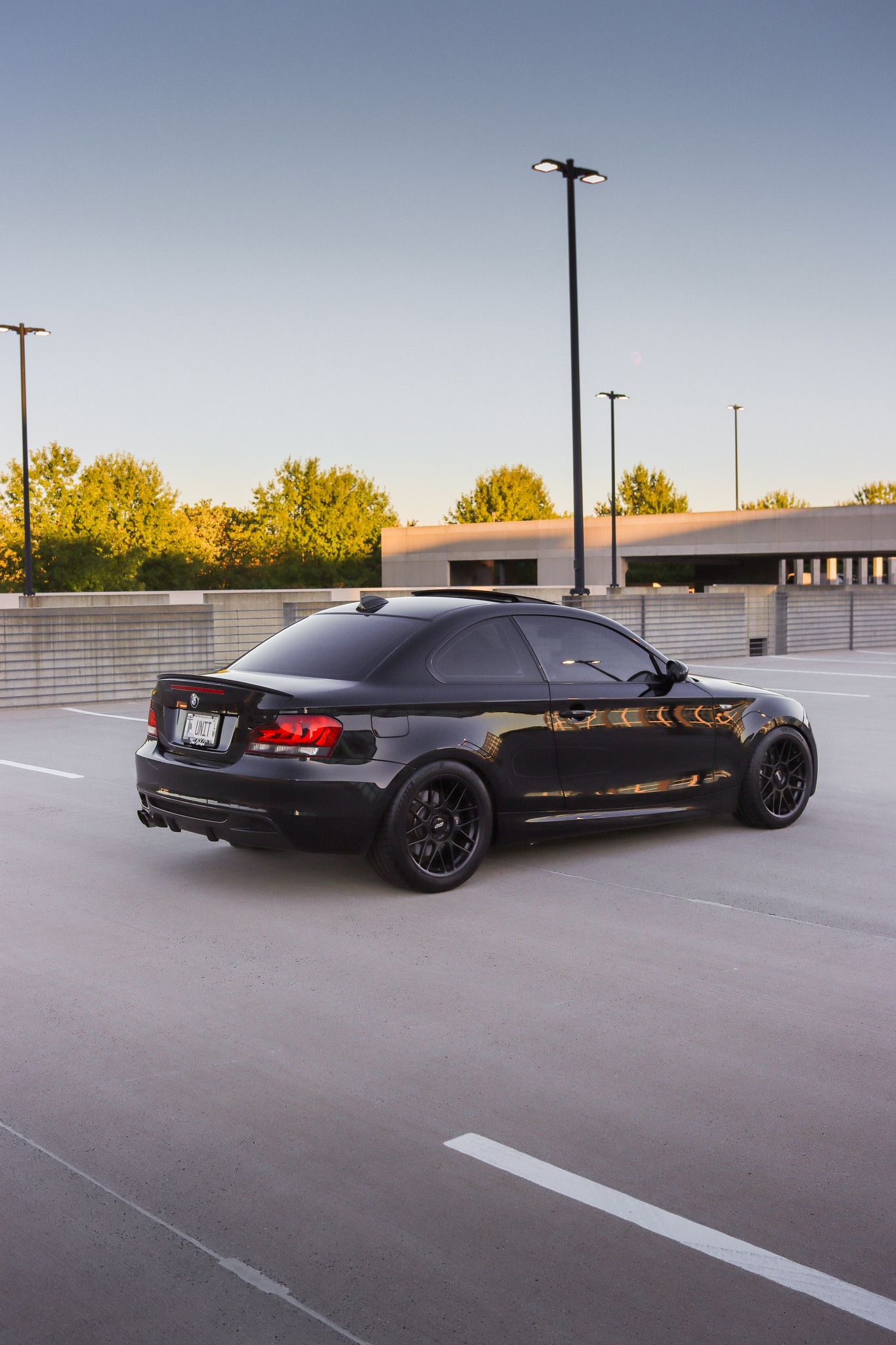 Black BMW E82 Coupe 1 Series with 18" ARC-8 Apex wheels in Satin Black