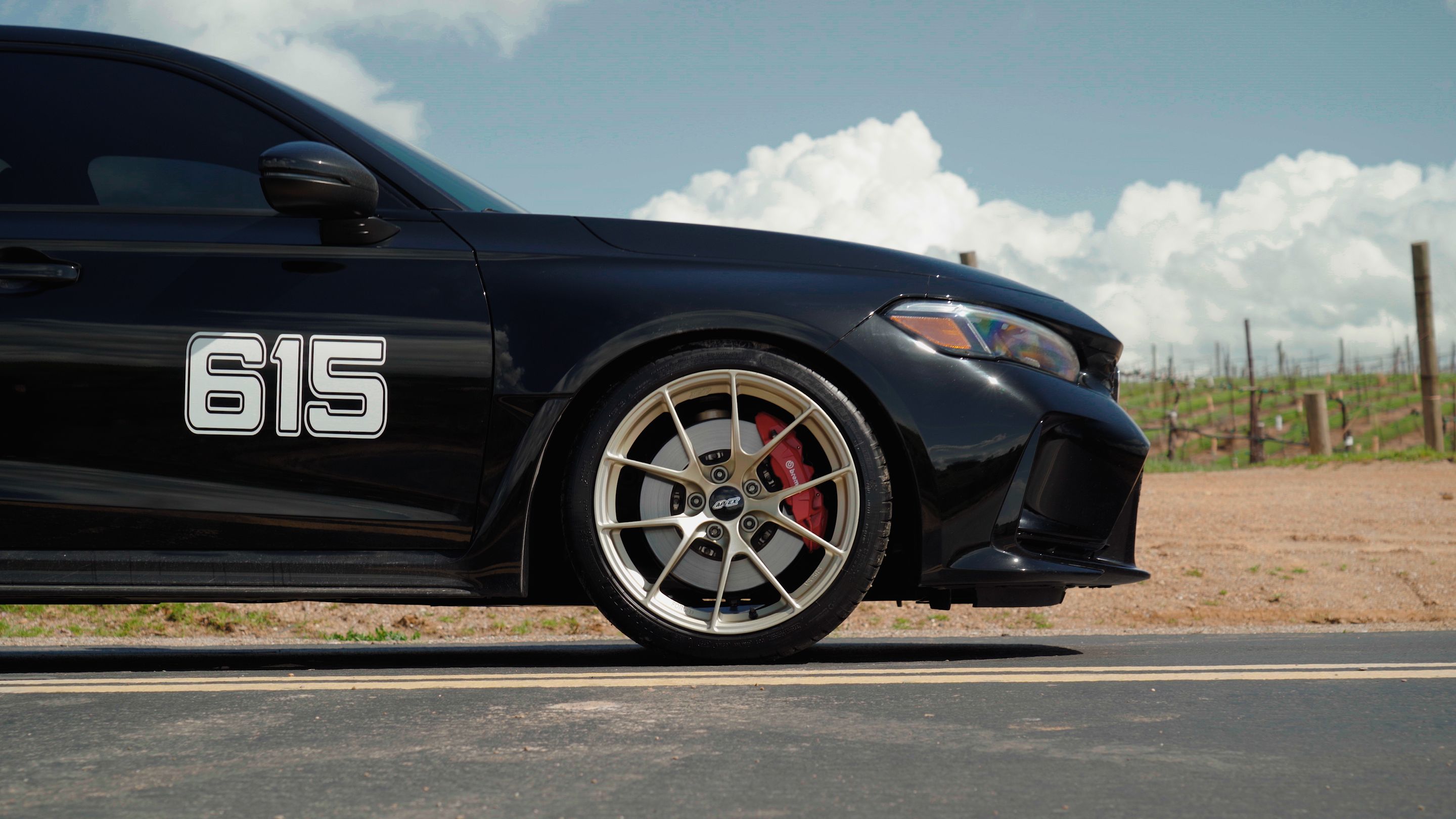 Black Honda FL5 Civic Type-R with 19" VS-5RS Apex wheels in Motorsport Gold