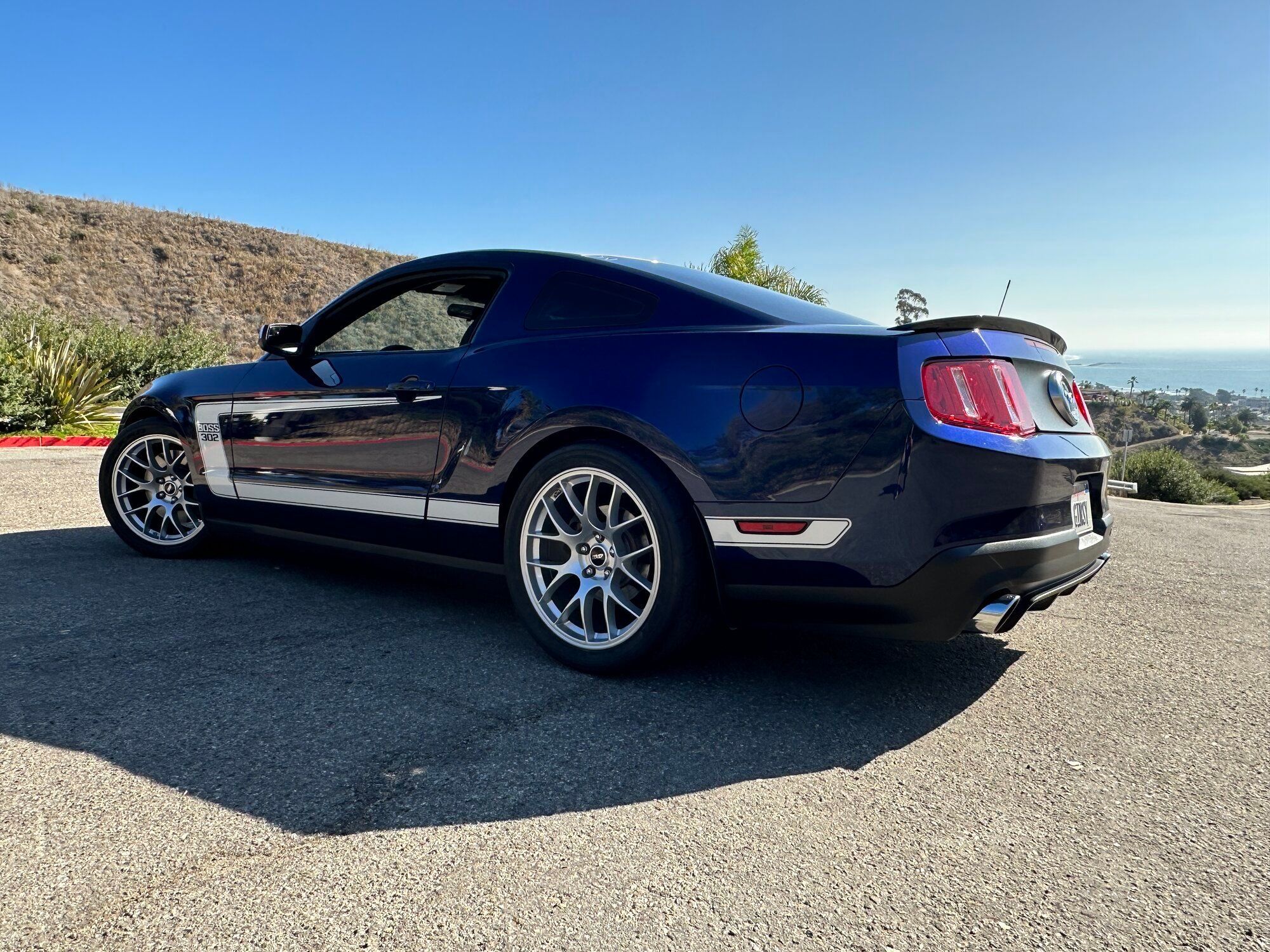 Blue Ford S197 Mustang Boss 302 with 19" EC-7 Apex wheels in Race Silver