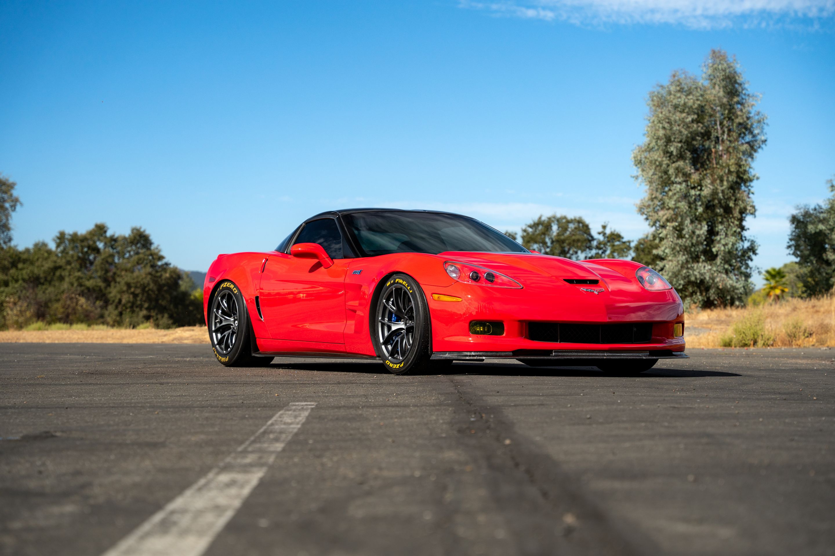Red Chevrolet C6 Corvette ZR-1 with 18" VS-5RE Apex wheels in Anthracite