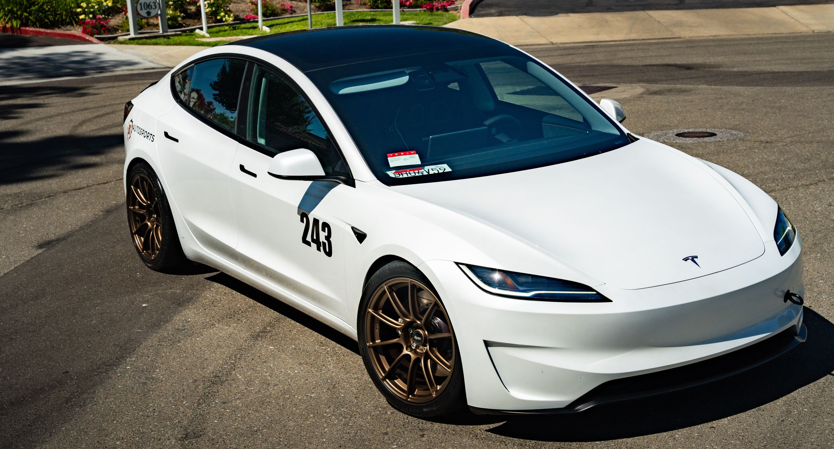 White Tesla Model 3 with 19" SM-10RS Apex wheels in Satin Bronze