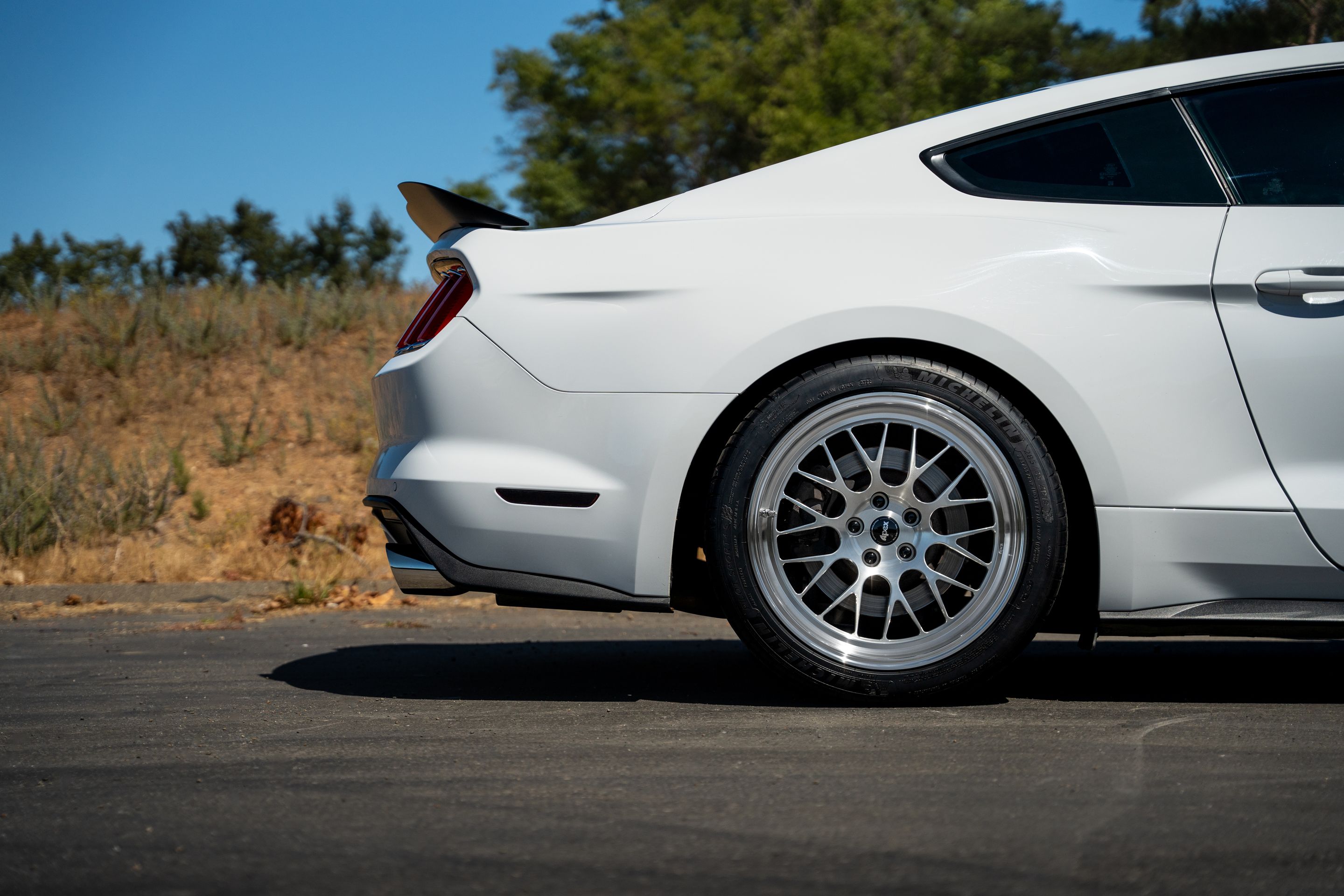 White Ford S550 Mustang GT with 19" ML-10RT Apex wheels in Machined Lip Brushed Clear
