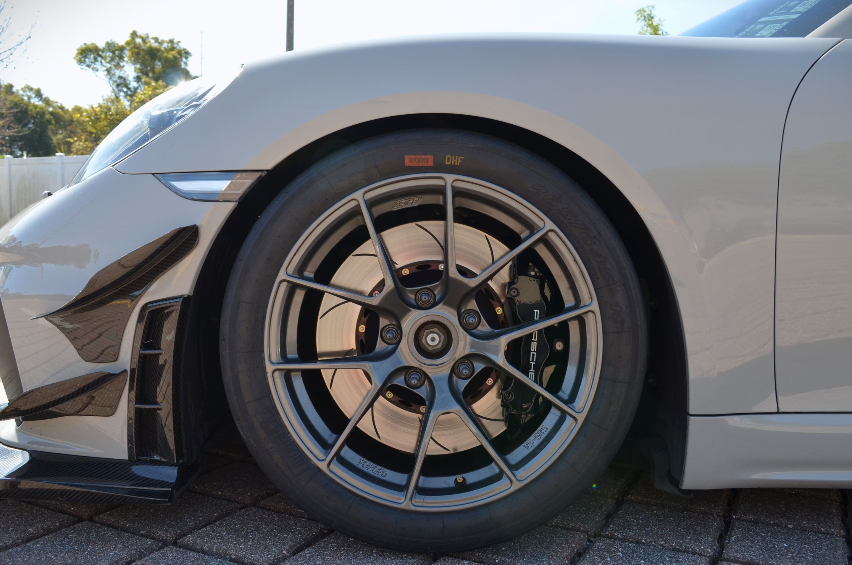 Grey Porsche 718 Cayman GT4 with 18" VS-5RS Apex wheels in Anthracite