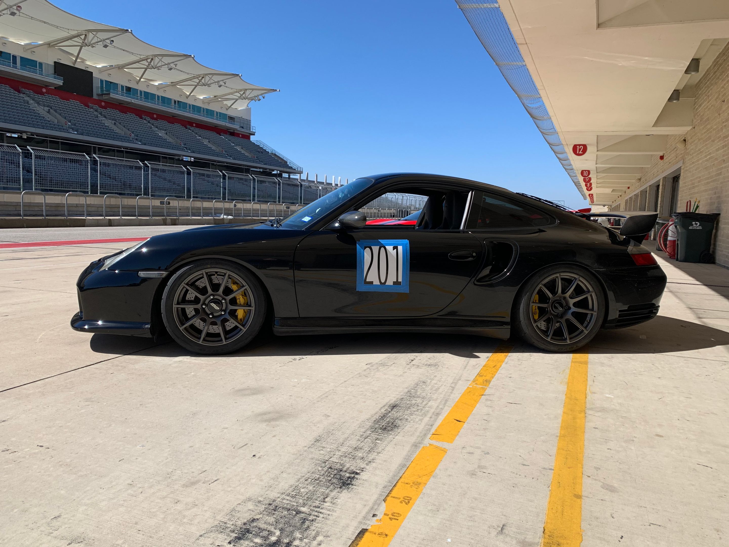 Black Porsche 911 996 GT2 with 18" SM-10 Apex wheels in Anthracite