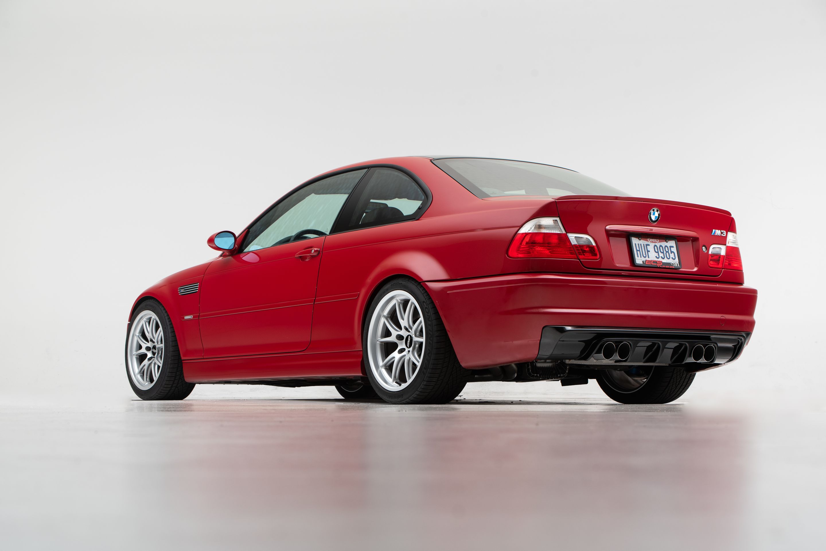 Red BMW E46 M3 with 18" FL-5 Apex wheels in Race Silver