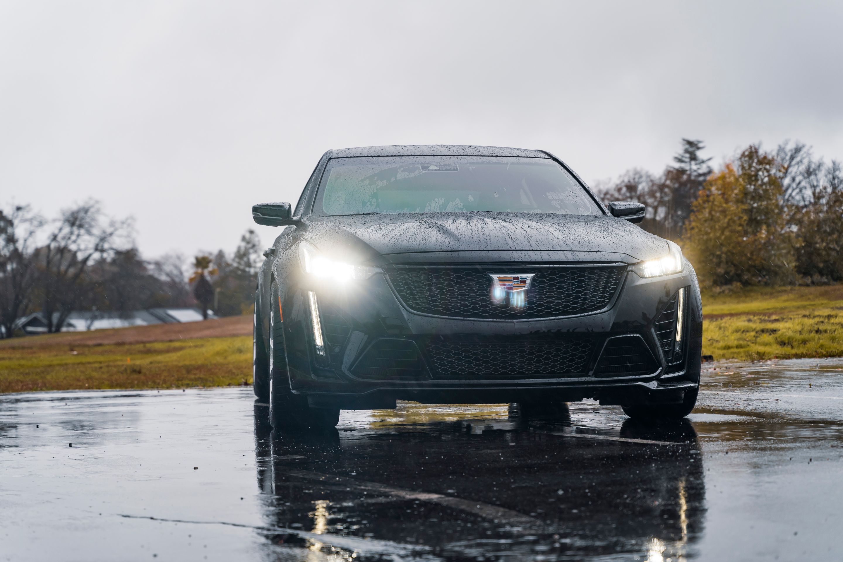 Black Cadillac CT5-V Blackwing with 20" VS-5RS Apex wheels in Brushed Clear
