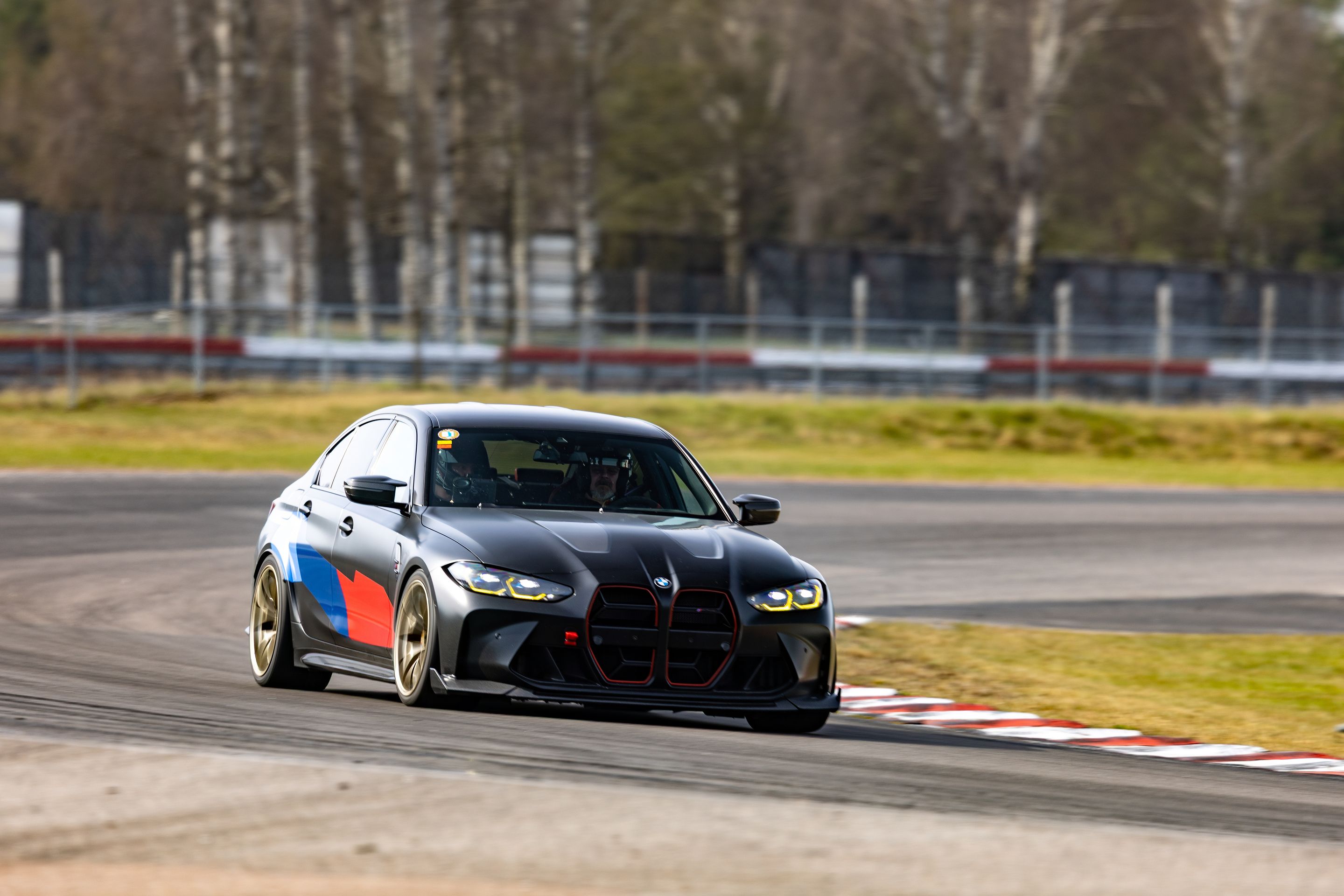 Black BMW G80 M3 with 19" VS-5RS Apex wheels in Motorsport Gold