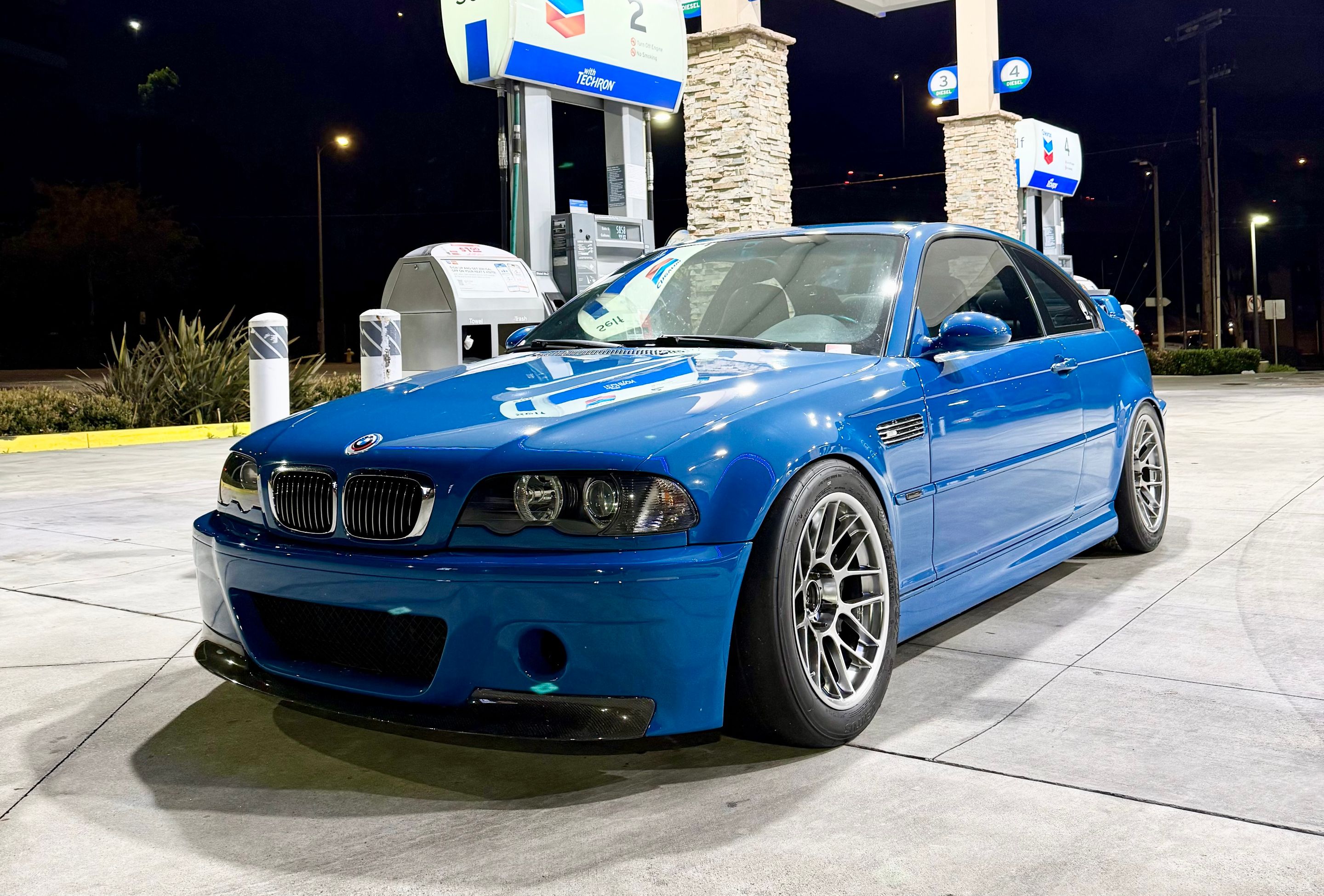 Blue BMW E46 M3 with 17" ARC-8 Apex wheels in Hyper Black