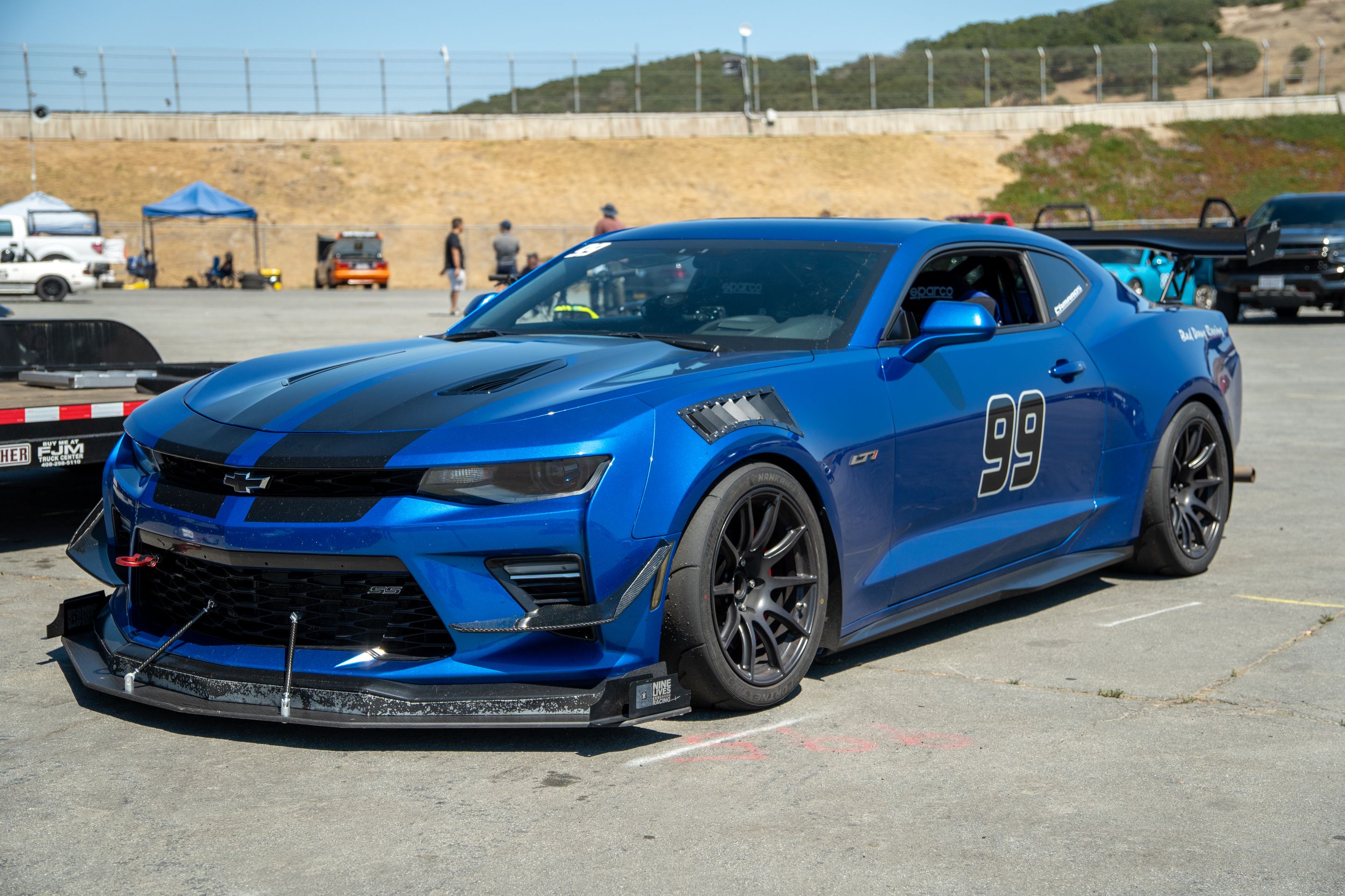 Blue Chevrolet 6th Gen Camaro SS with 18" SM-10 Apex wheels in Satin Black
