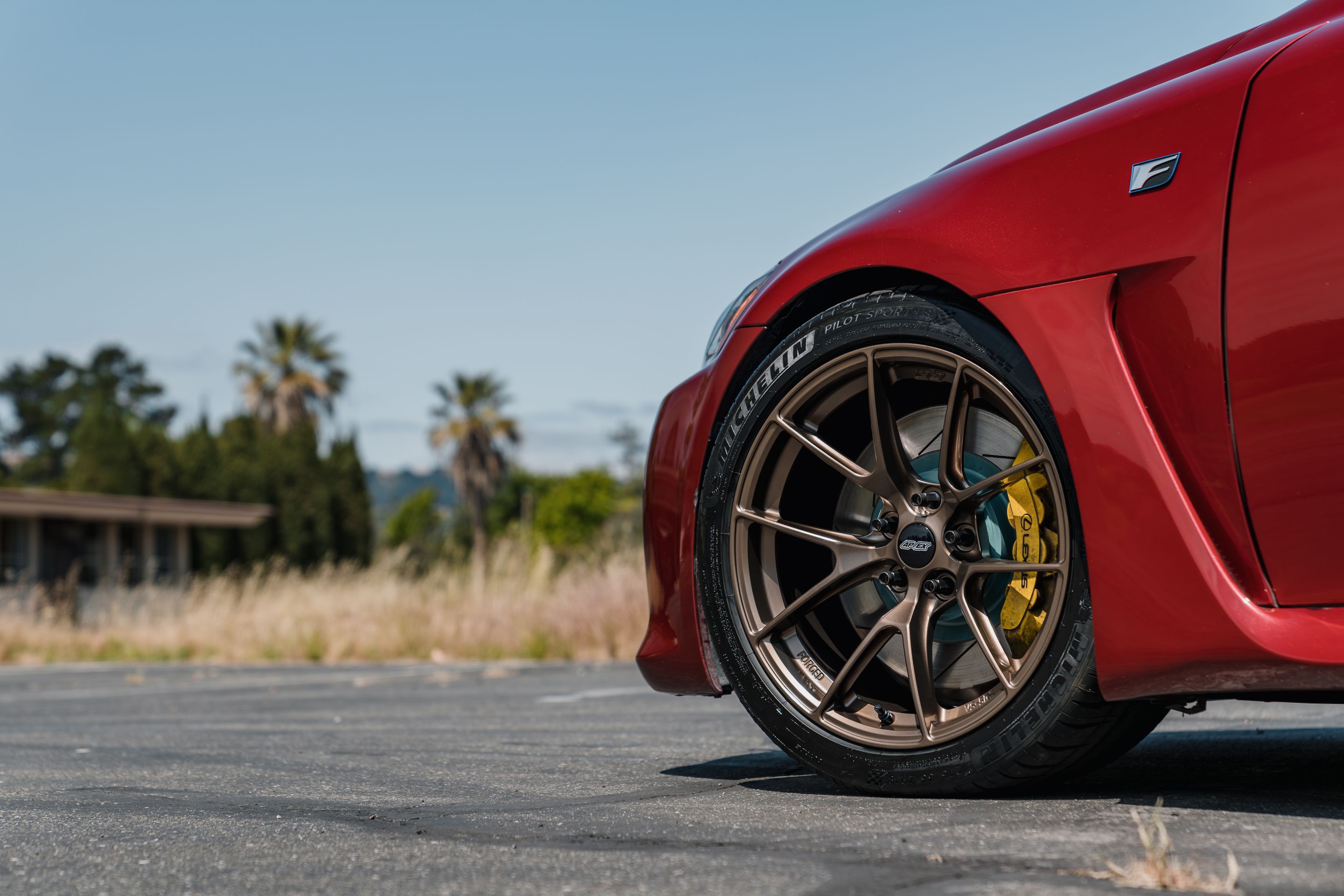 Red Lexus USE20 IS-F with 18" VS-5RS Apex wheels in Satin Bronze