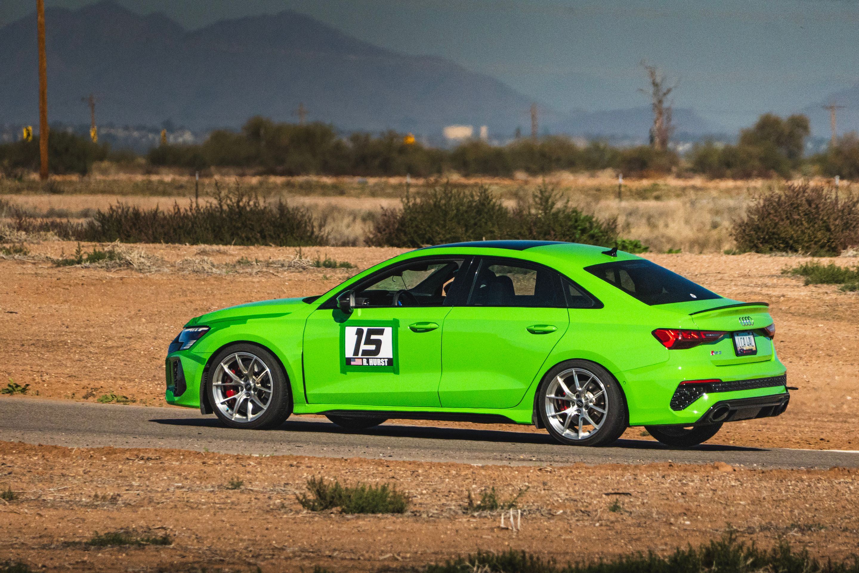 Green Audi 8Y RS 3 with 18" VS-5RS Apex wheels in Brushed Clear