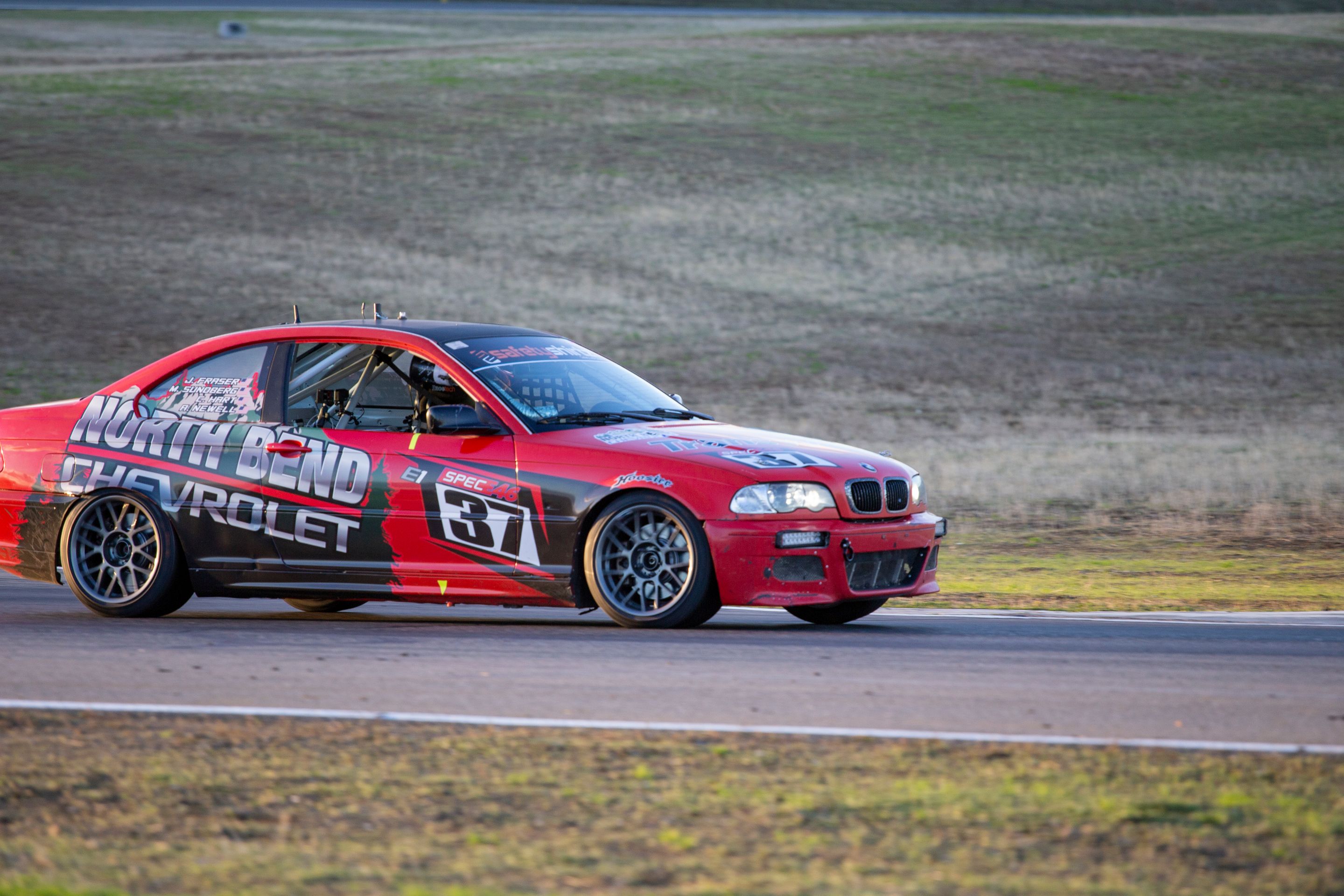 Red BMW Spec E46 with 17" ARC-8 Apex wheels in Race Silver