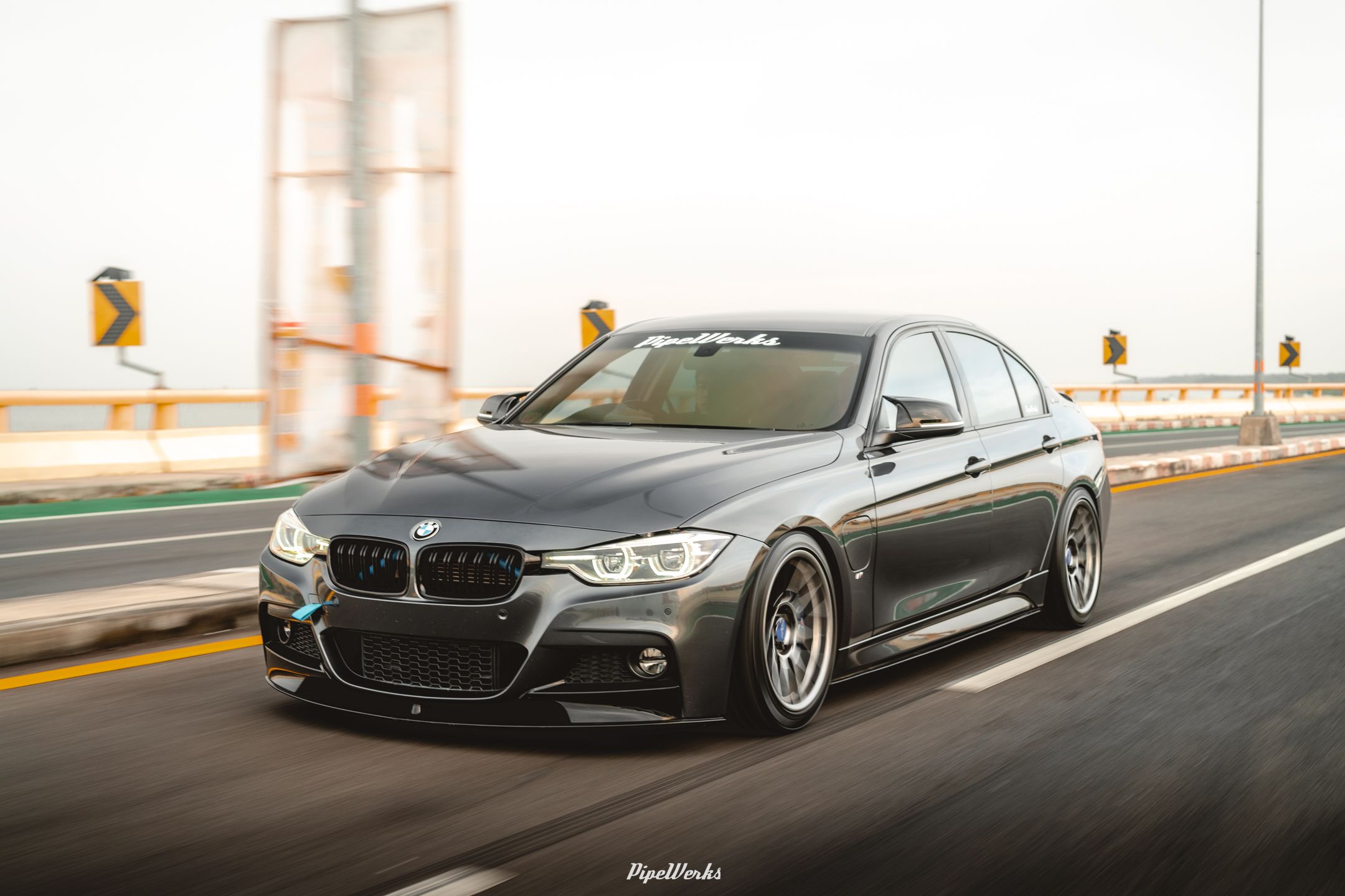 Grey BMW F30 Sedan 3 Series with 18" ARC-8 Apex wheels in Hyper Black