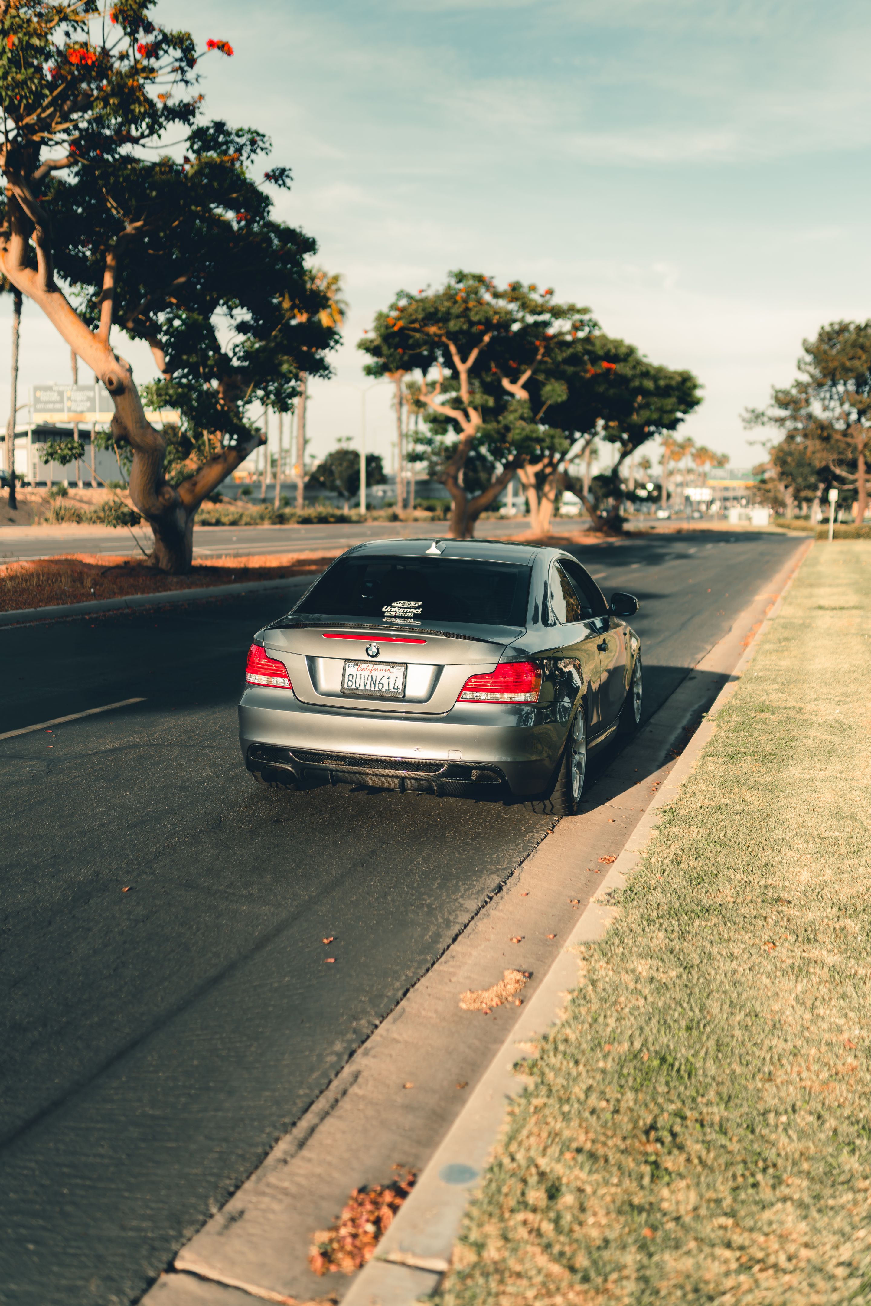 Grey BMW E82 Coupe 1 Series with 18" EC-7 Apex wheels in Race Silver