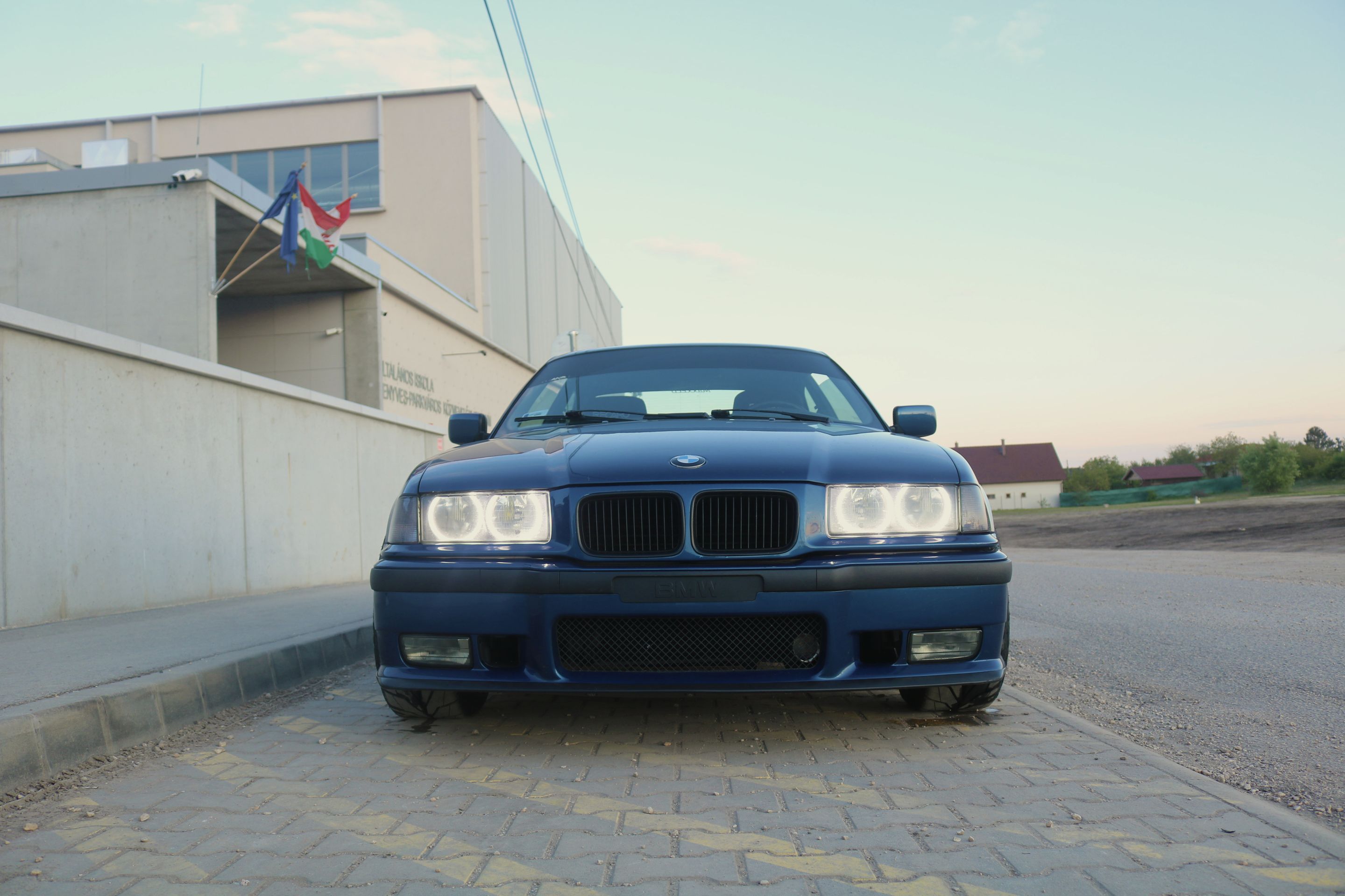 Blue BMW E36 3 Series with 17" ARC-8 Apex wheels in Race Silver