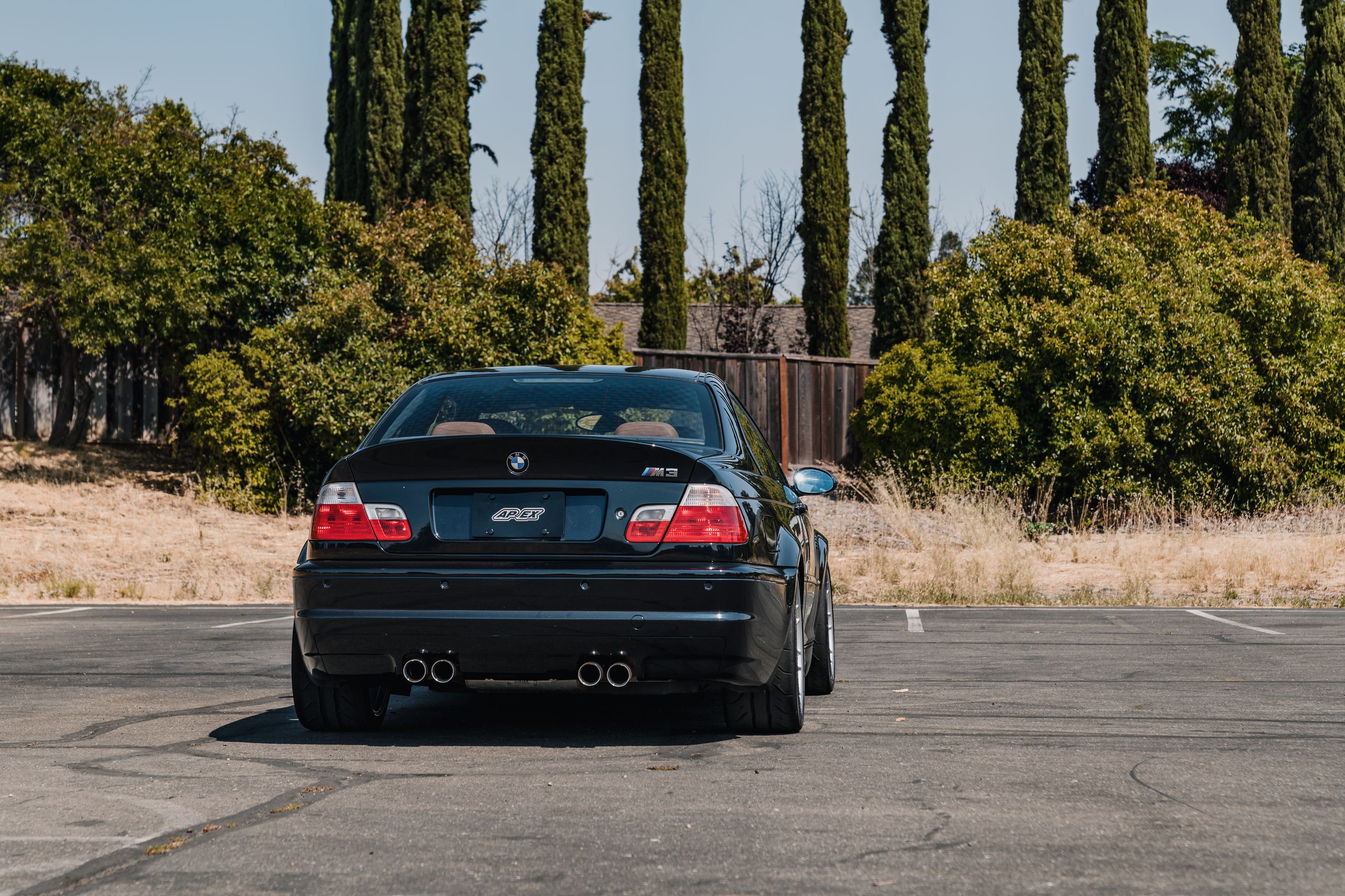 Black BMW E46 M3 with 18" ARC-8 Apex wheels in Hyper Silver
