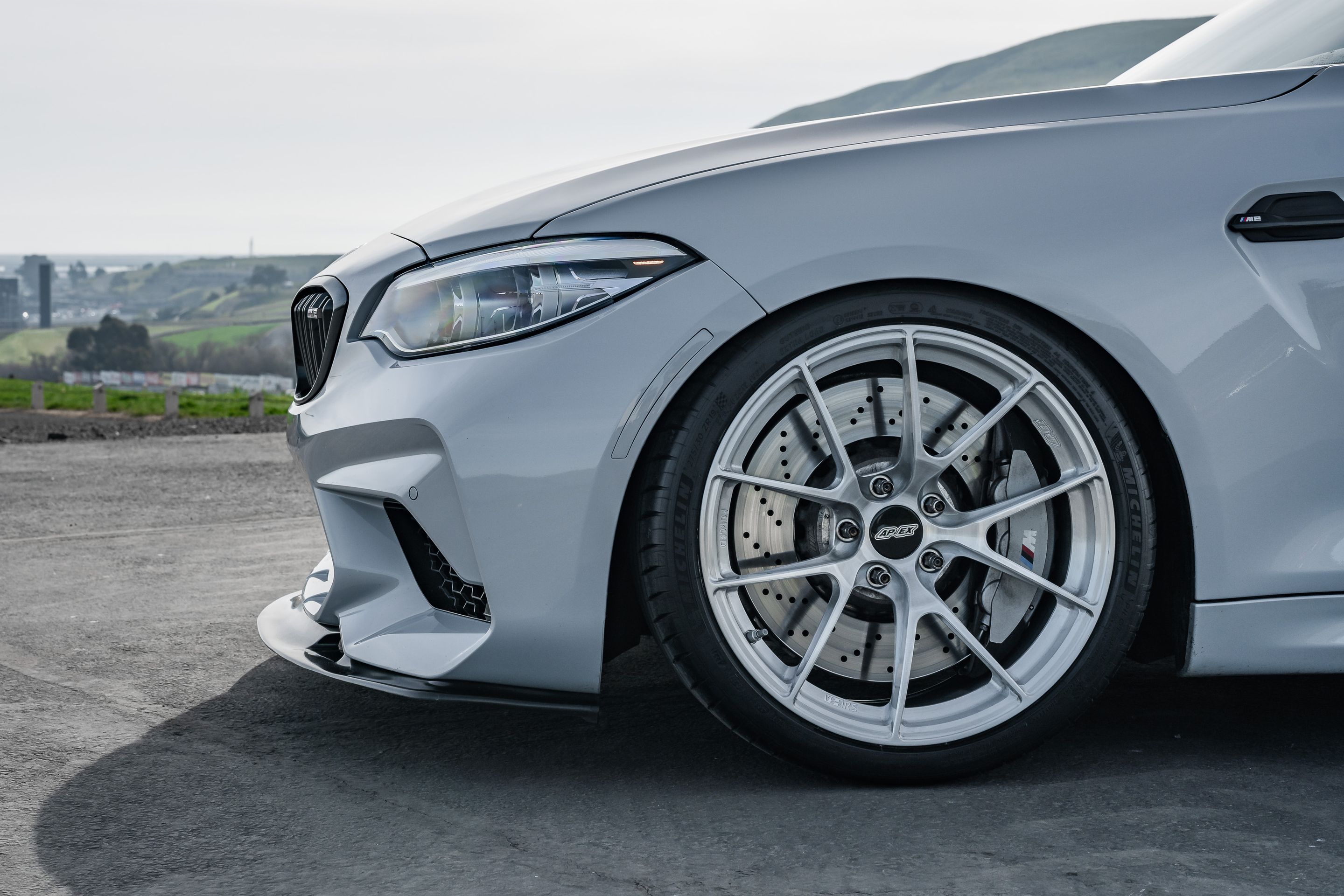 Silver BMW F87 M2 with 19" VS-5RS Apex wheels in Brushed Clear