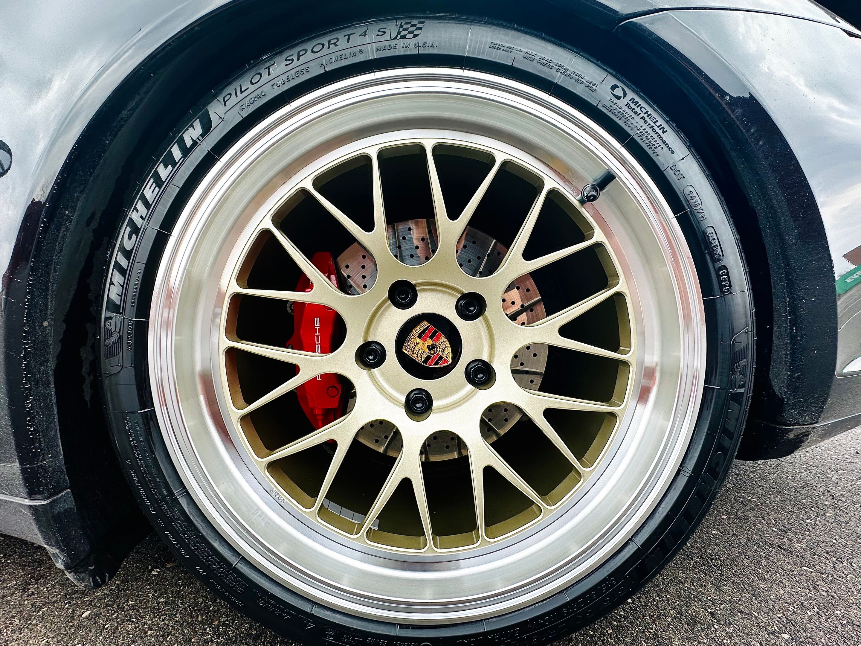 Black Porsche 911 997 Carrera 4S with 19" ML-10RT Apex wheels in Machined Lip Gloss Motorsport Gold