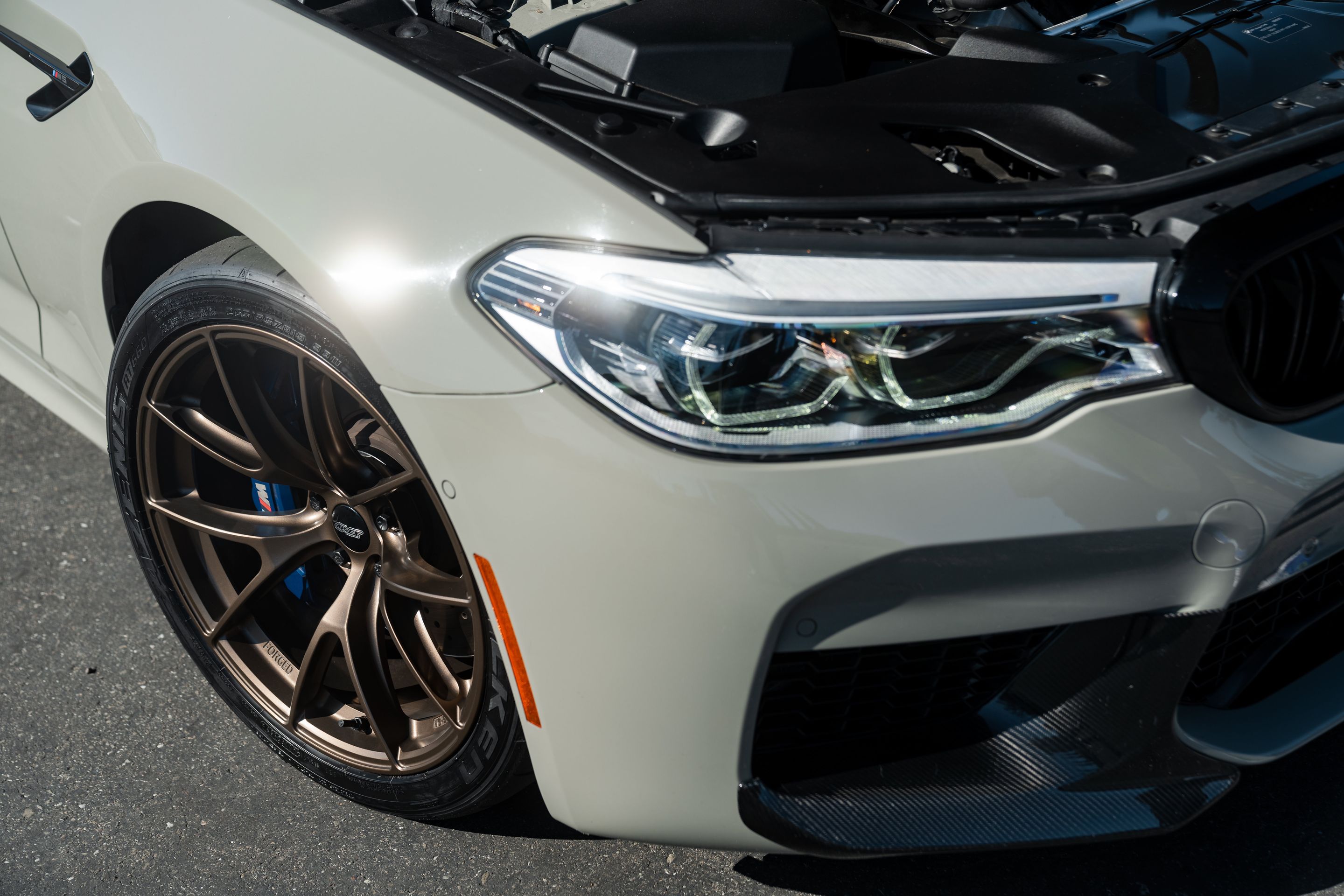 Grey BMW F90 M5 with 19" VS-5RS Apex wheels in Satin Bronze