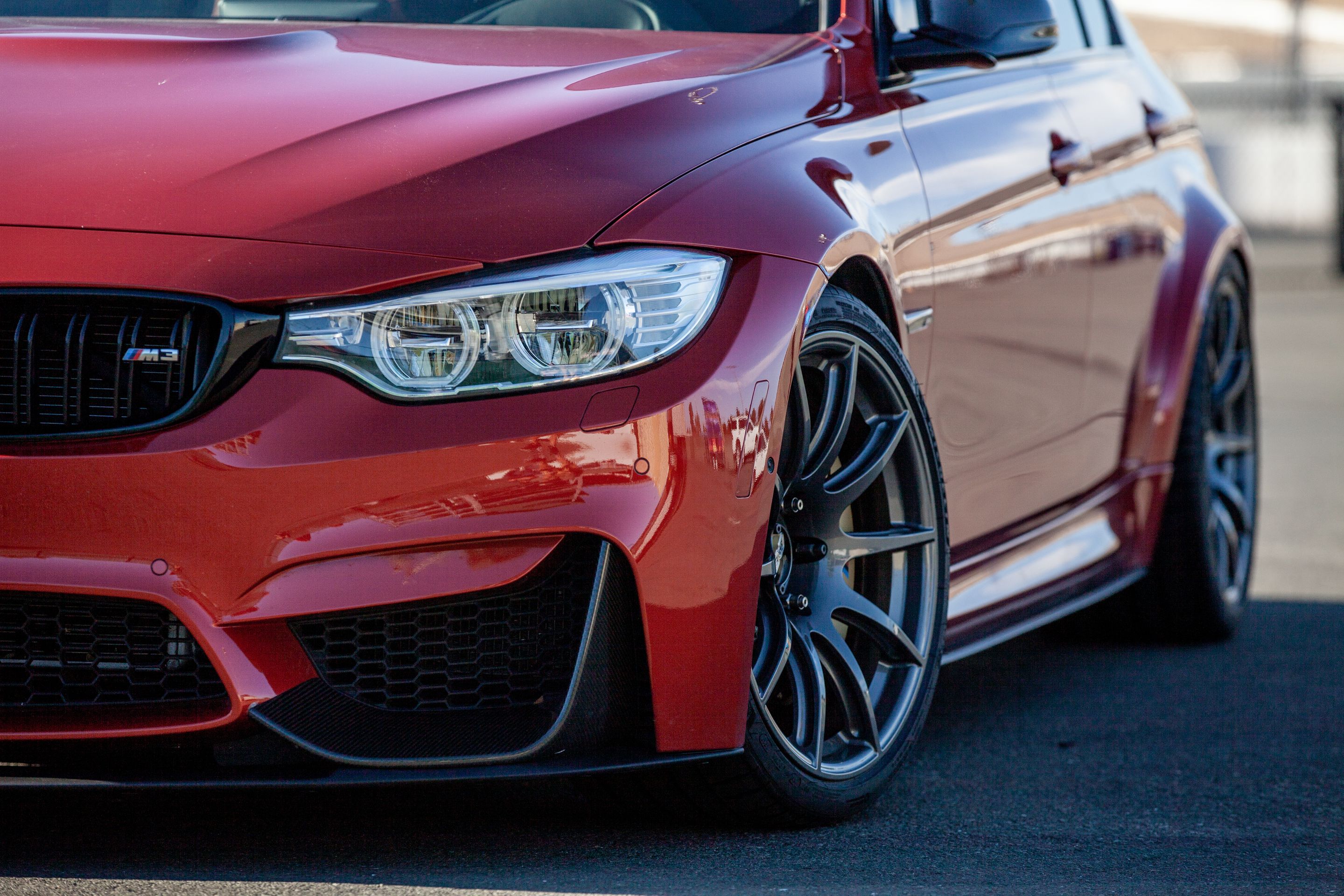 Orange BMW F80 M3 with 19" SM-10 Apex wheels in Anthracite